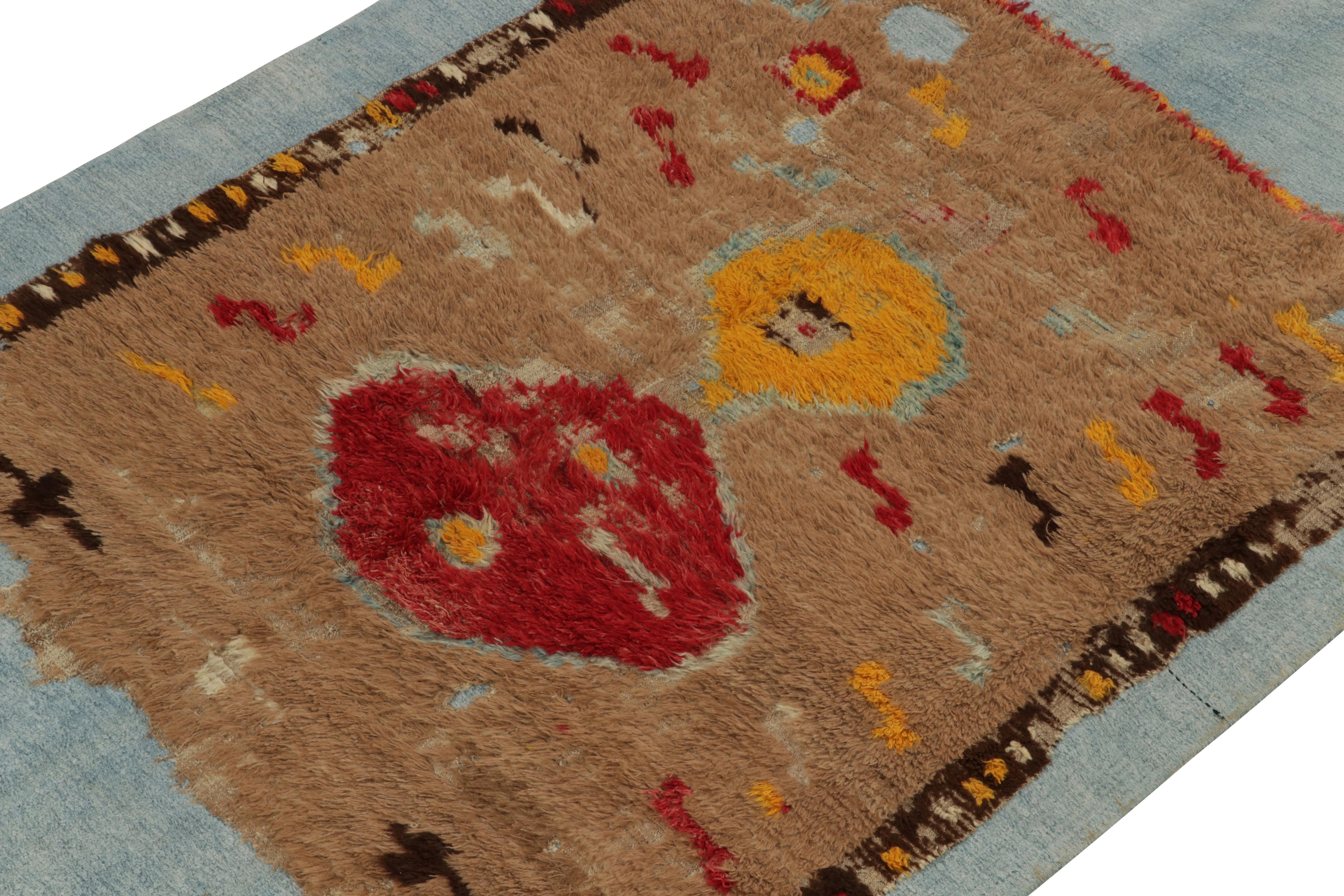 Hand-Knotted Rug & Kilim's Distressed Brown rug fragment on blue flat weave For Sale