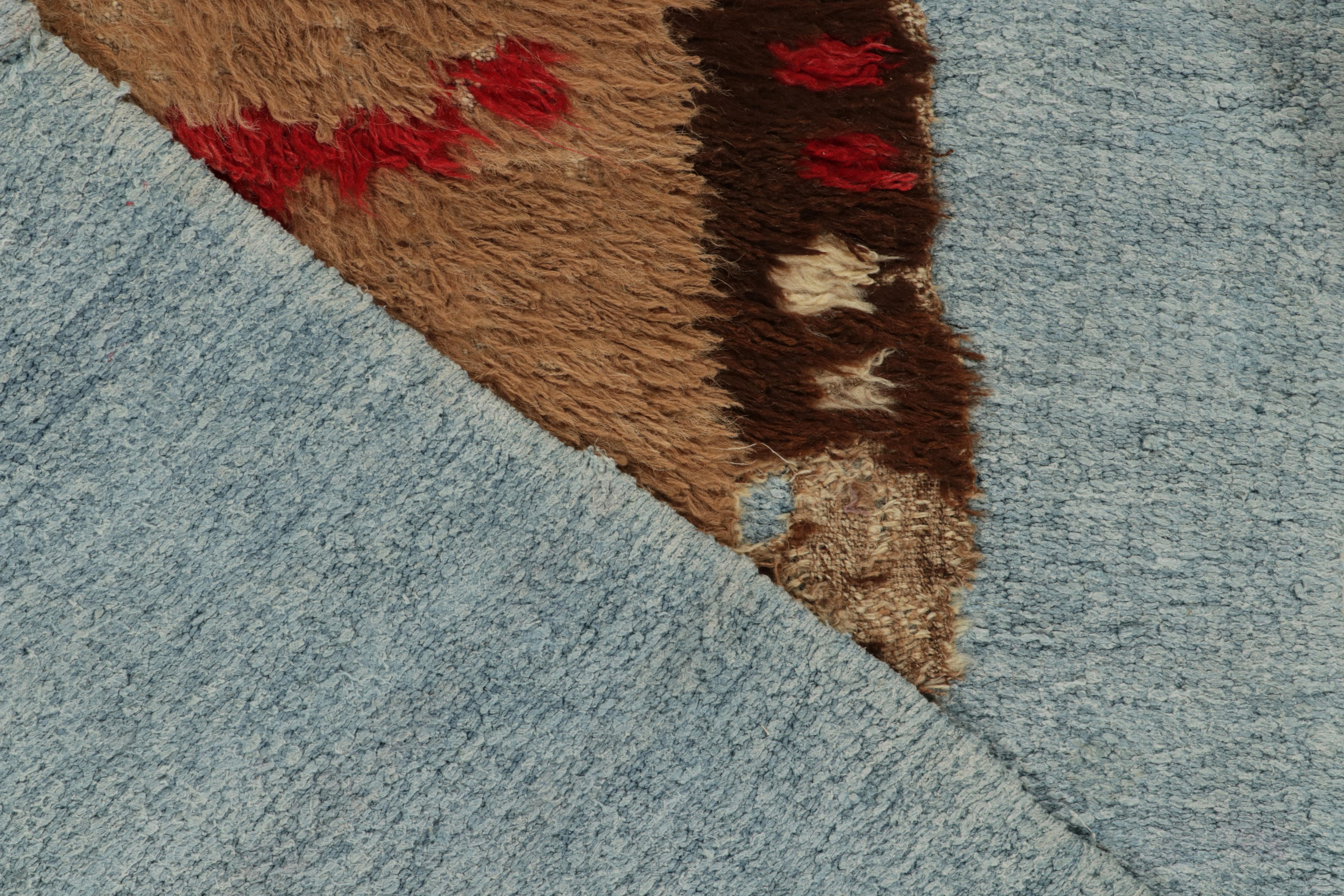 Contemporary Rug & Kilim's Distressed Brown rug fragment on blue flat weave For Sale