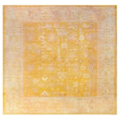 Tapis Oushak ancien jaune citron tissé à la main
