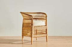 Handwoven Malawi Cane Lounge Chair in Open Weave with White Linen Cushion