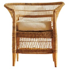 Handwoven Malawi Cane Lounge Chair in Open Weave with White Linen Cushion