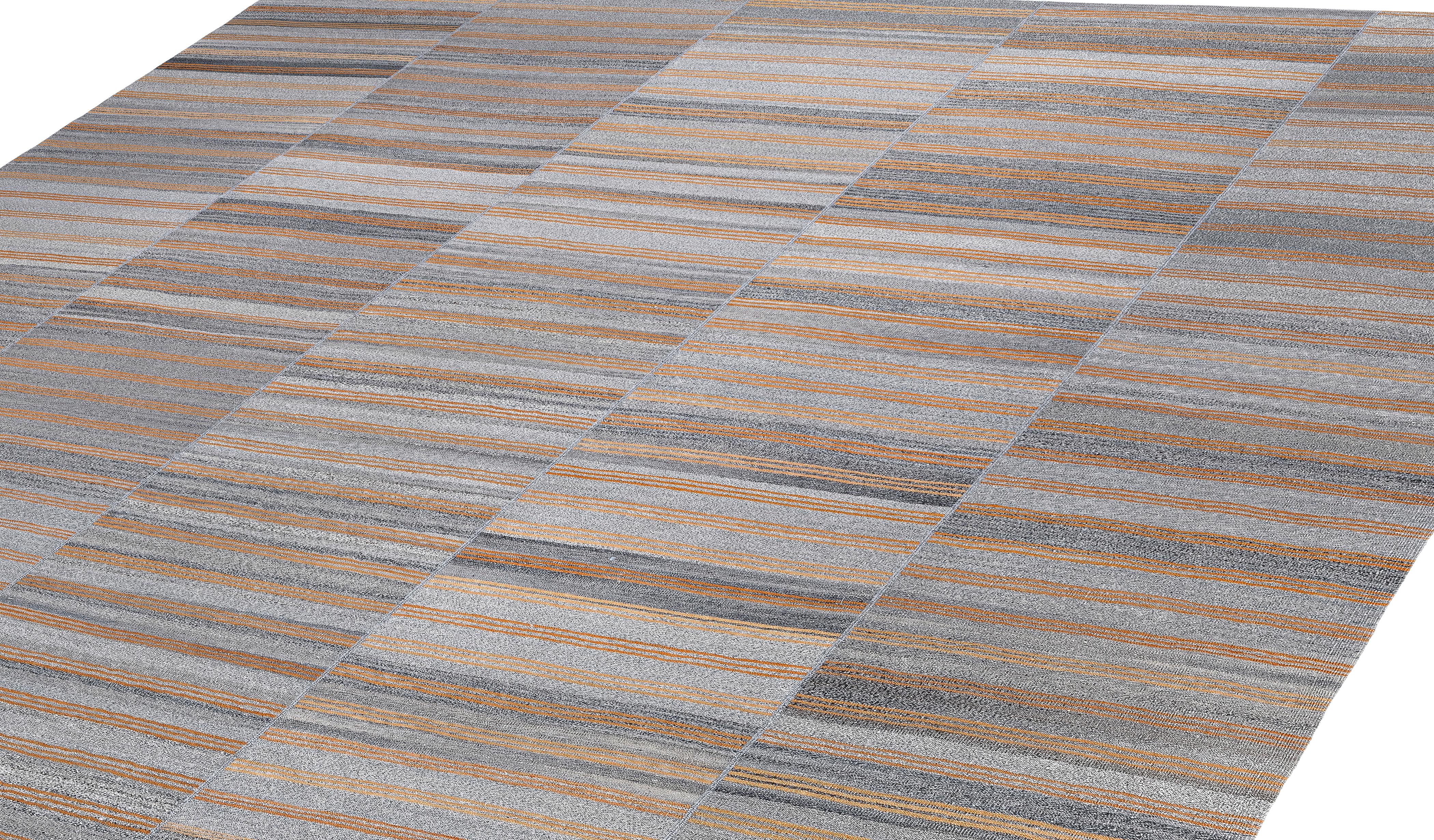 This exceptional Mazandaran flat weave rug is a handwoven masterpiece crafted in northern Iran using 100% hand-spun local wool and fully organic, plant-based dyes. Its refined natural gray background—derived from undyed, neutral wool—is beautifully