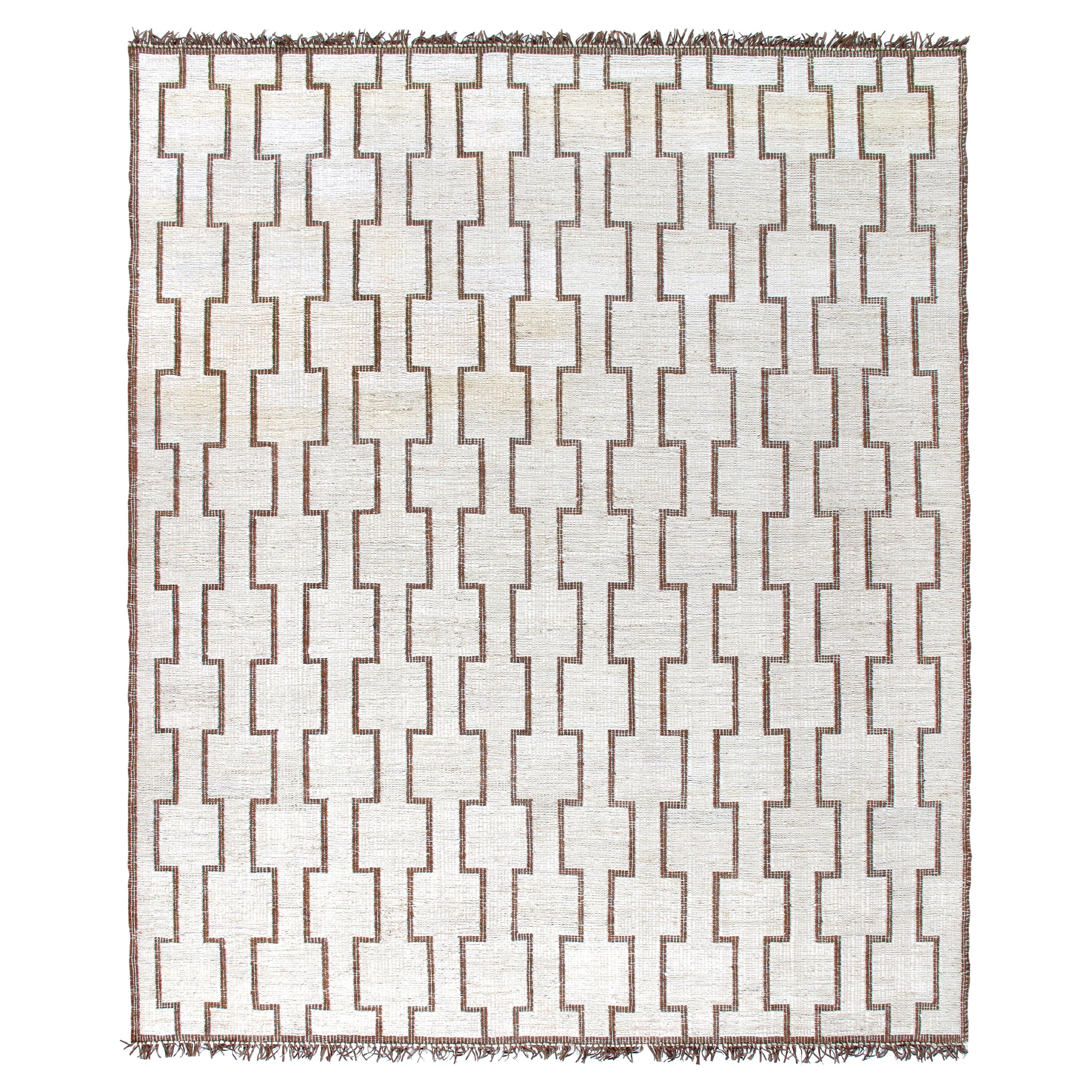 Handgewebter moderner indischer Teppich Merinowolle
Leder, marokkanisch inspiriert von den Tuareg