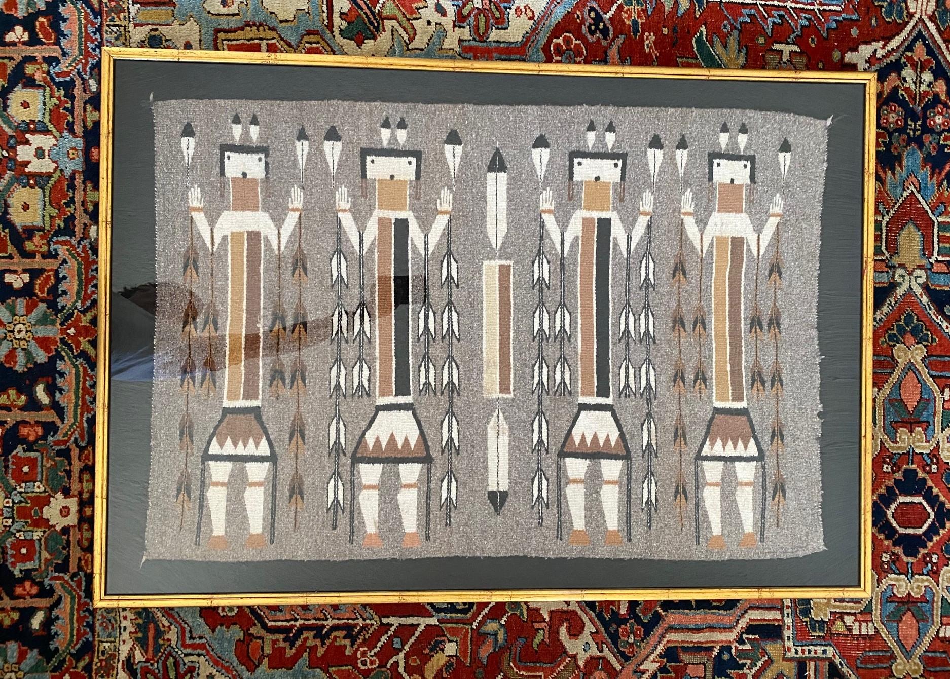 A beautifully composed and intricately woven Navajo Yei pictorial rug/blanket featuring four Navajo dancers portraying Yei (Yeibichai) characters. Yei is the Navajo name for benevolent, holy beings who possess supernatural healing powers. 

This