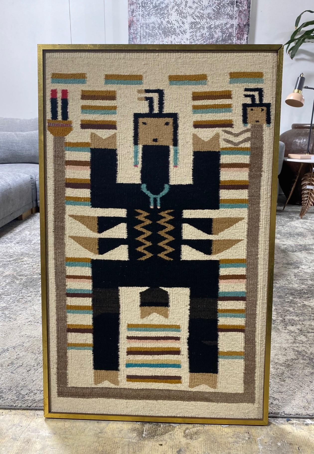 A beautifully composed and intricately woven Navajo Yei pictorial rug/blanket featuring a Navajo dancer portraying a Yei (Yeibichai) character. Yei is the Navajo name for benevolent, holy beings who possess supernatural healing powers. 

This work