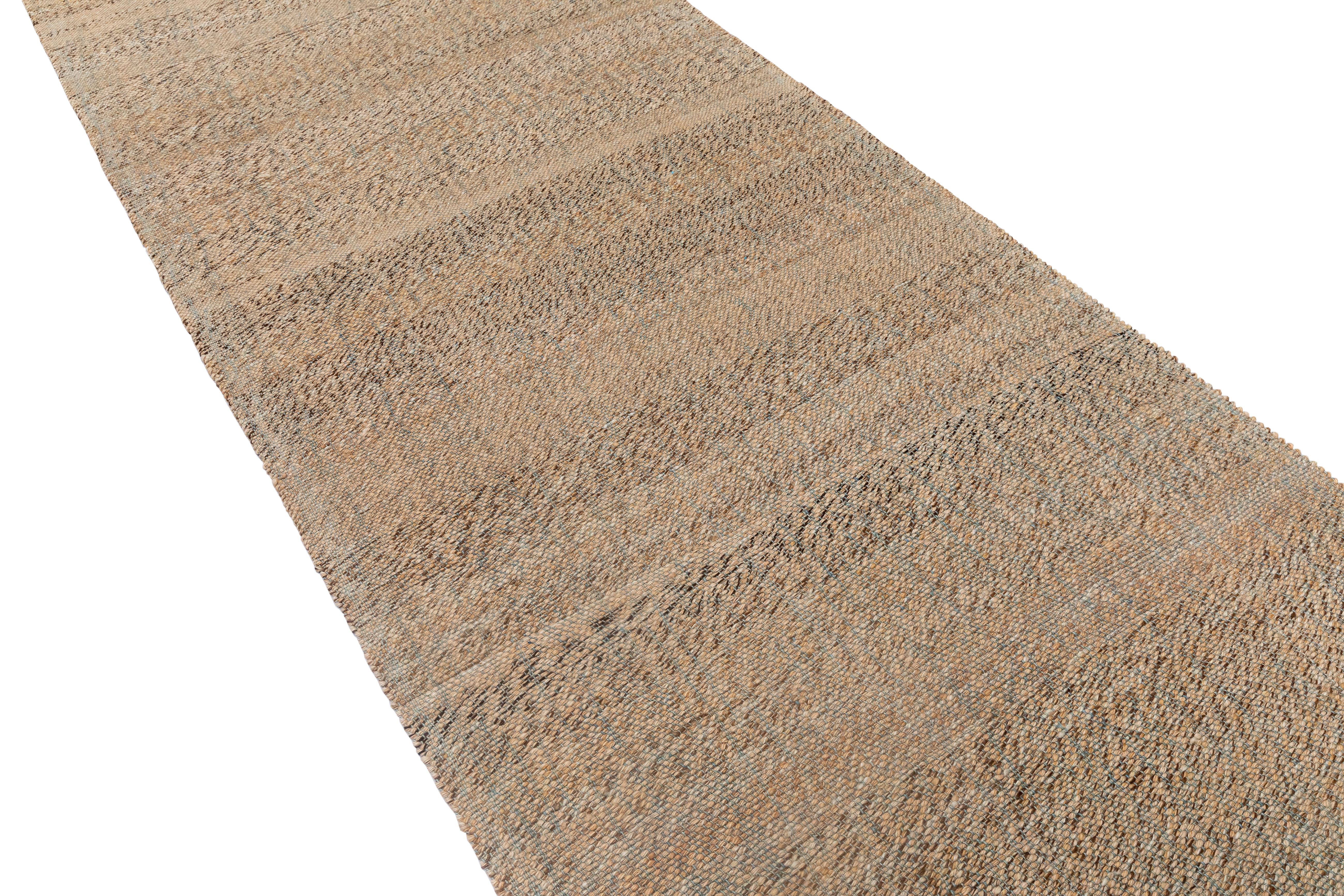 This handcrafted Palas kilim runner is a beautiful example of time-honored weaving traditions, made entirely from handspun wool and natural vegetable dyes. The flatweave construction and elongated proportions make it ideal for use as a runner in
