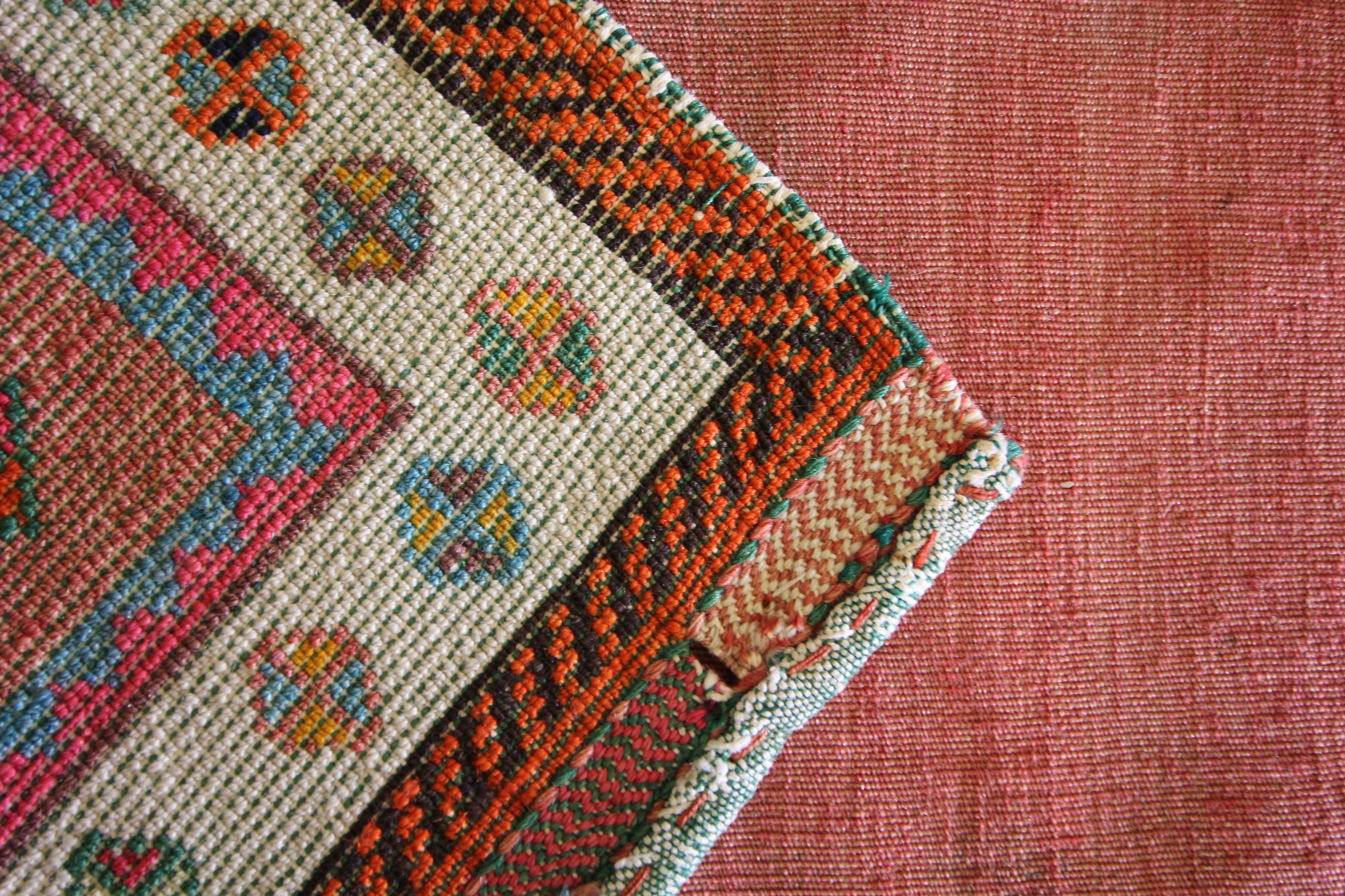 Early 20th Century Handwoven Oriental Saddle Bag, Collectable Pink-Red Wool Khorjin Rug For Sale