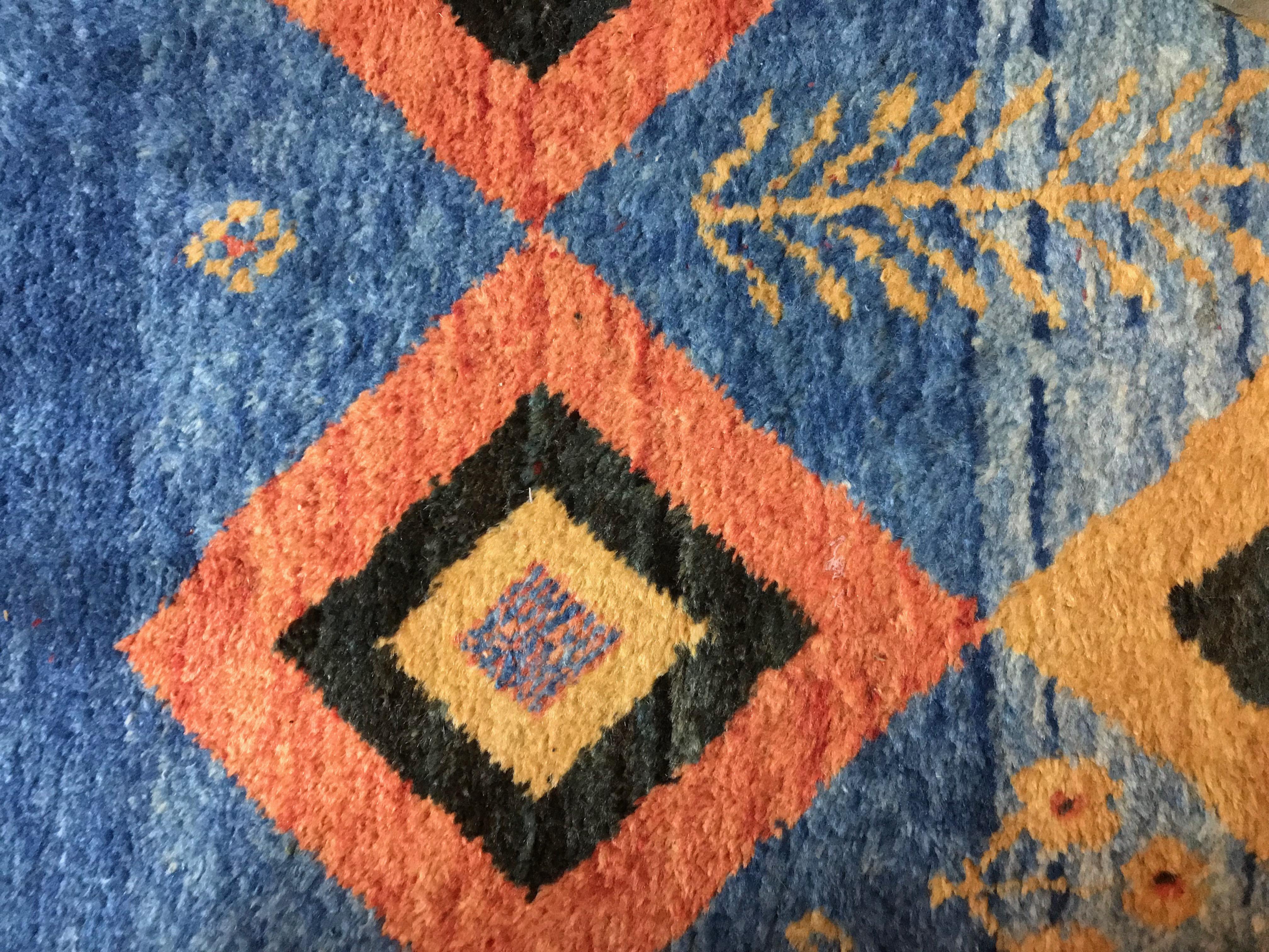 A handwoven Persian wool carpet with great colors.