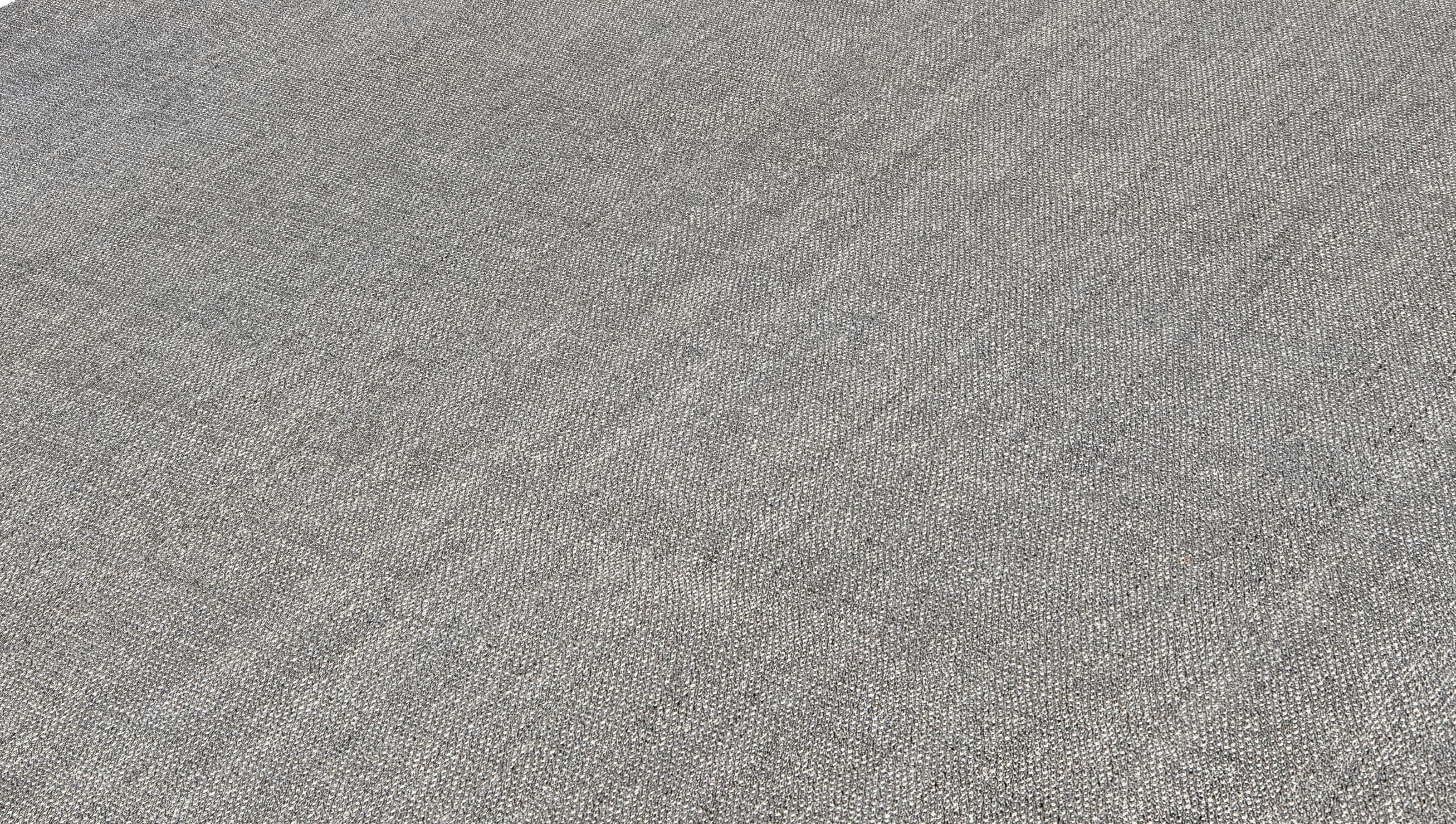 This elegant flatweave rug is handwoven in Iran using handspun wool blended with linen and dyed exclusively with natural, organic dyes. Its design is inspired by the antique Kurdish kilims of western Iran—rugs known for their durability, simplicity,