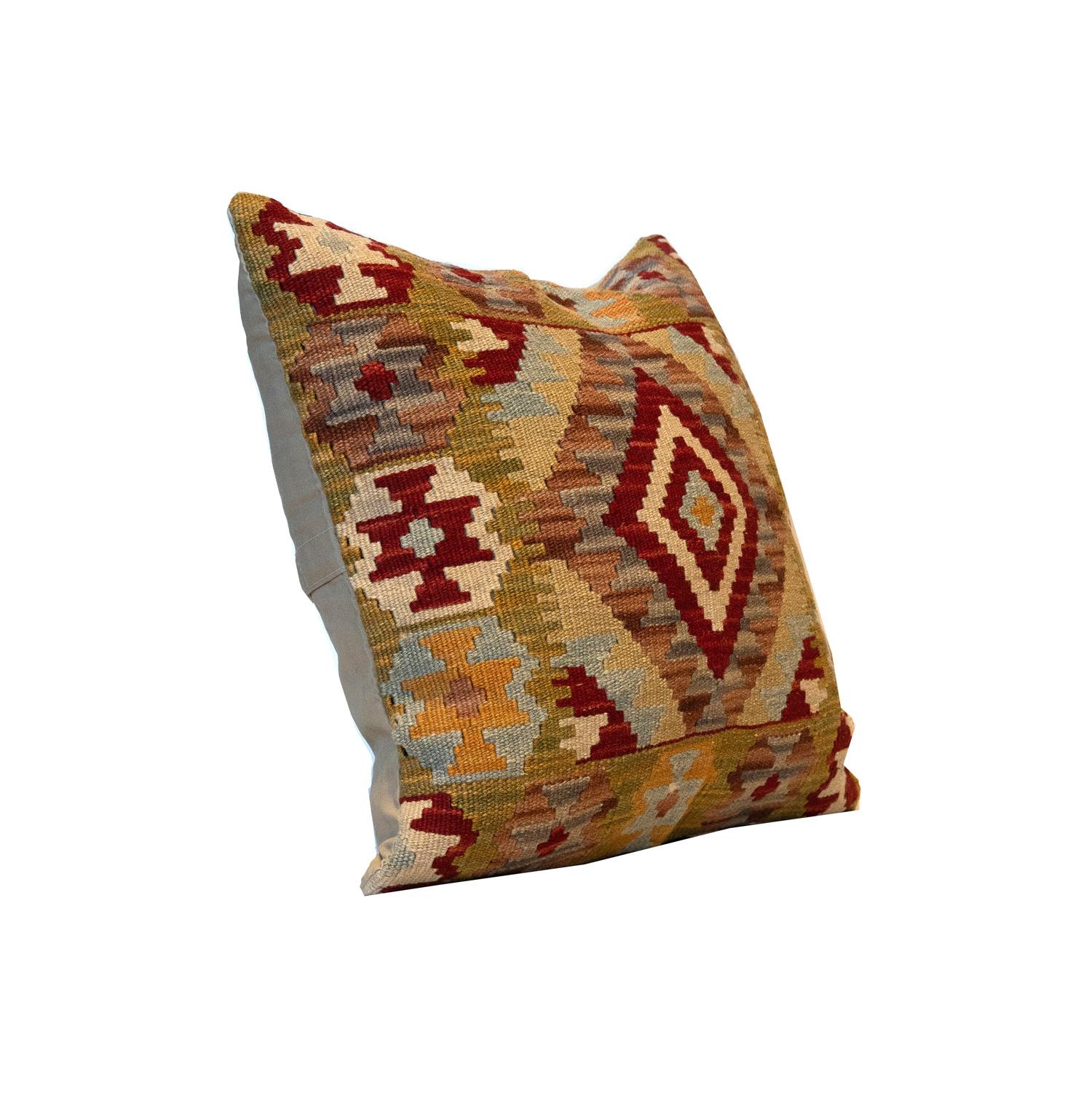 This traditional Kilim cushion cover has been handwoven with the traditional Kilim, flat-weave technique. featuring a geometric pattern woven in beige, cream, blue and red. Decorate your bed, sofa or armchair with this fantastic piece as a scatter
