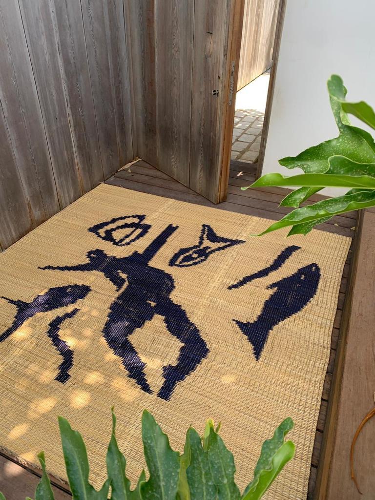 Hand-Crafted Handwoven Rug in Natural Fiber with a Touch of African Elegance for Your Home For Sale