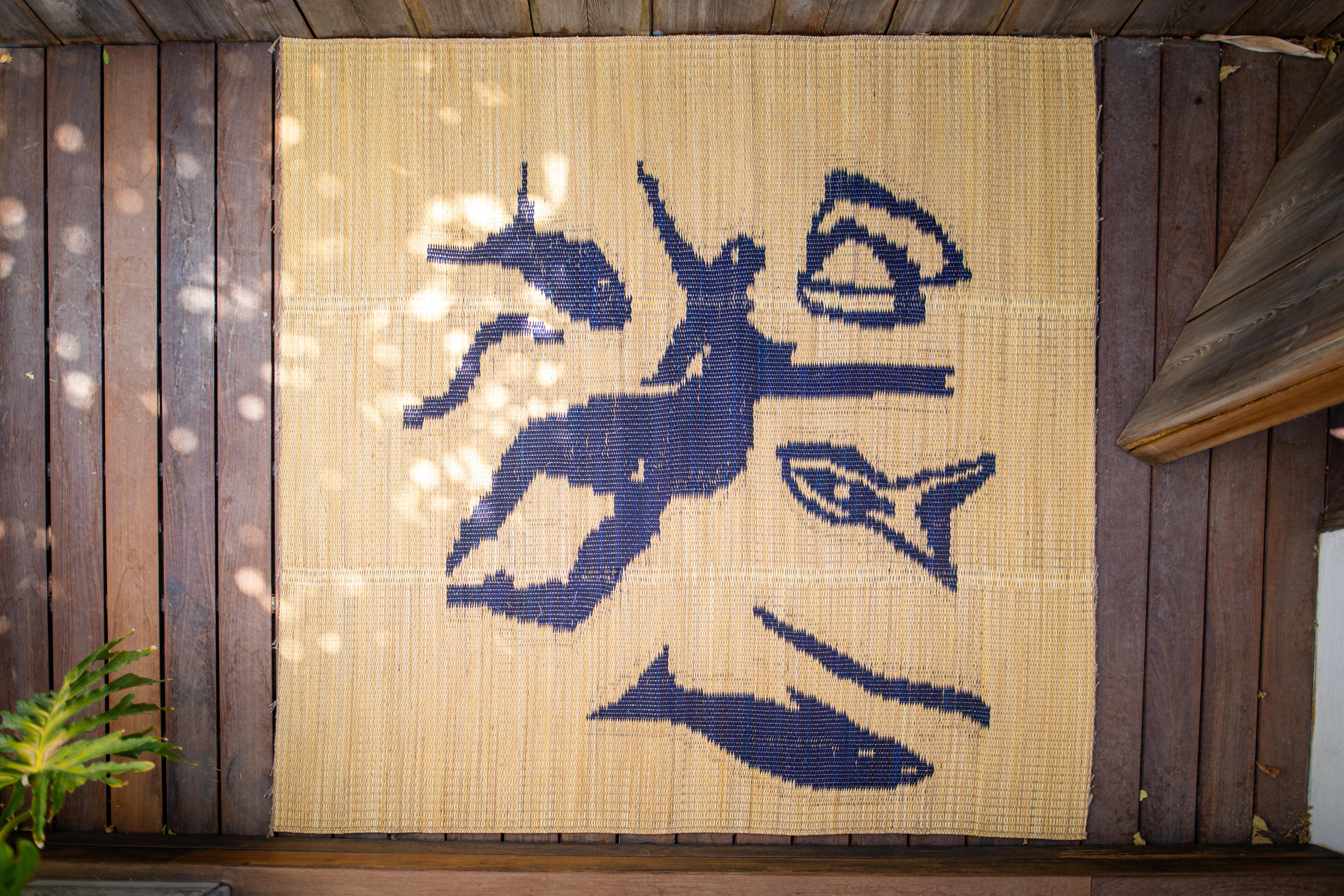 Contemporary Handwoven Rug in Natural Fiber with a Touch of African Elegance for Your Home For Sale