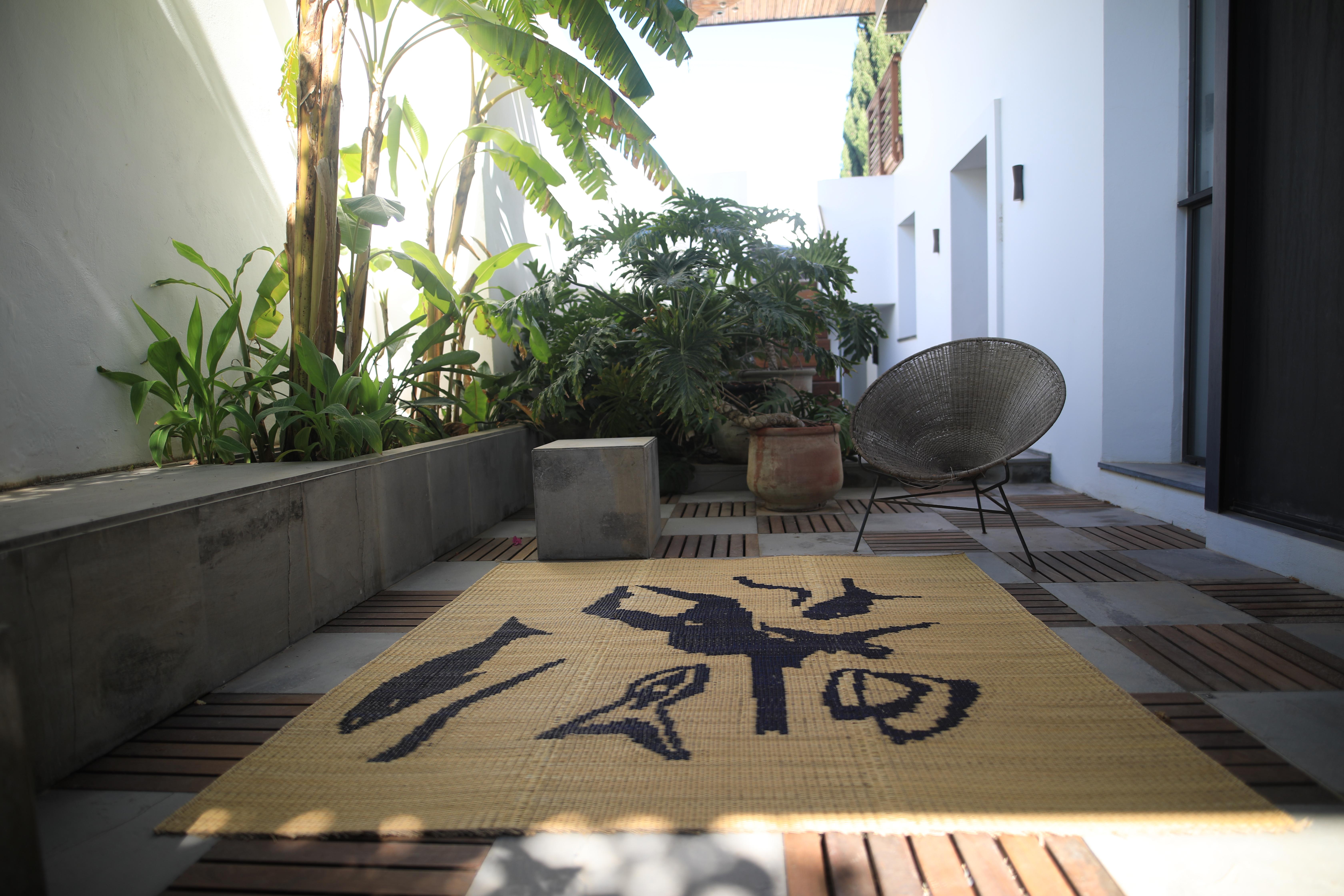 Handwoven Rug in Natural Fiber with a Touch of African Elegance for Your Home For Sale 1