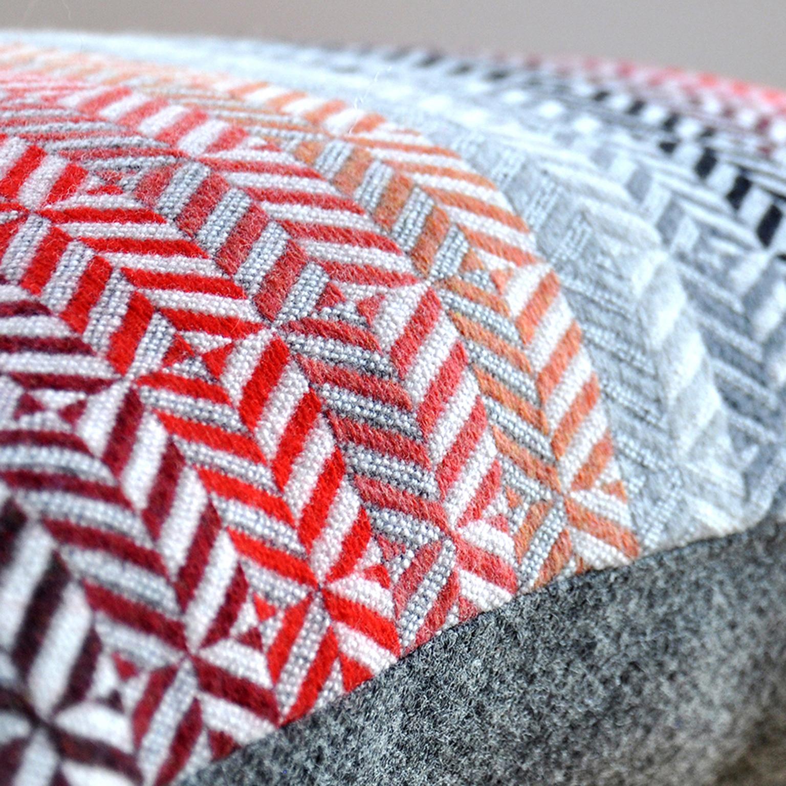 Drawing inspiration from the color and pattern found in stain glass work, the Saint Gilles cushion takes its name from an area of Brussels renowned for its Art Deco architecture.

Handwoven on a dobby loom in our studio using soft merino lambswool