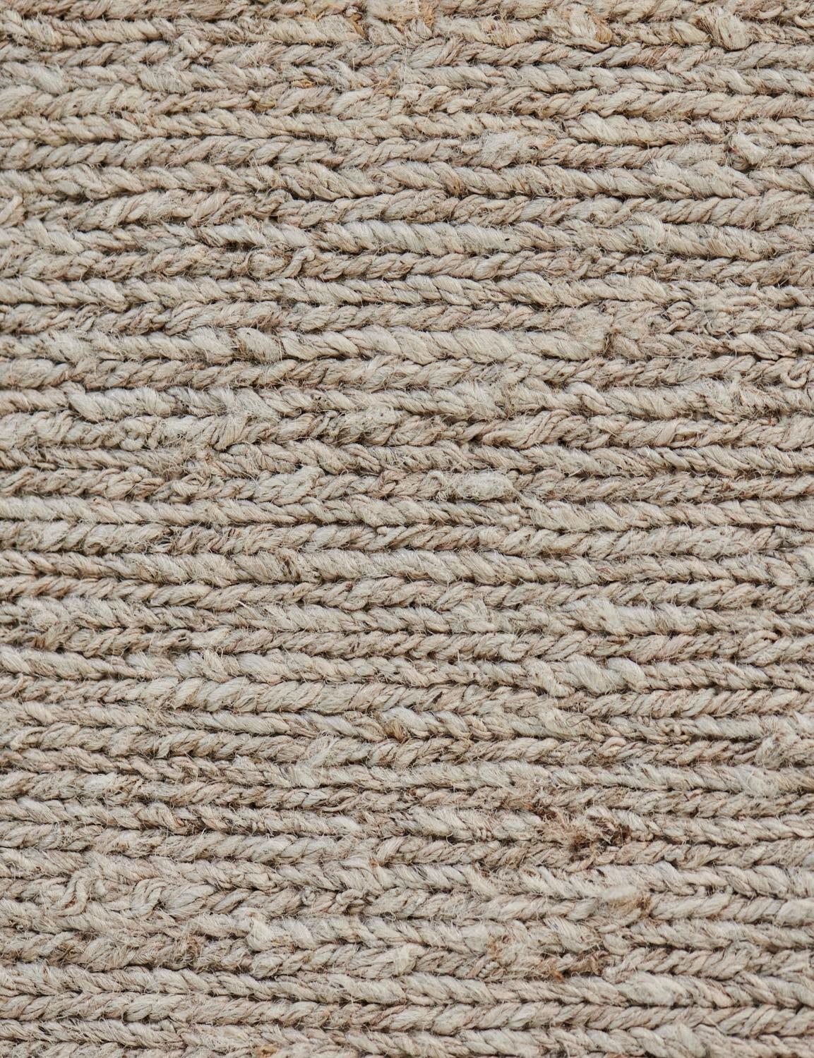 This handwoven textured rug is part of the Mansour Modern collection which is primarily inspired by vintage rugs whose textures and designs are relevant as ever in the 21st century.