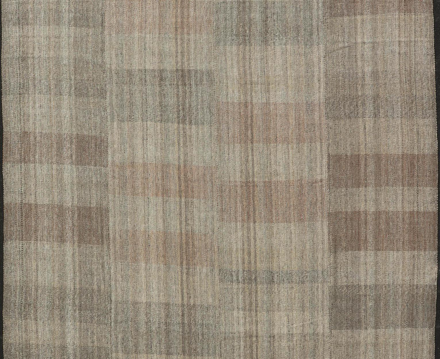 Measures: 10'4 x 14'4 
Handwoven Textured Kilim Rug with Subtle Geometric Design 10'4 x 14'4. Keivan Woven Arts / rug/VLM-7692, country of origin / type: Iran / Kilim, circa 21st Century. 

Showcasing a beautifully woven geometric pattern, this