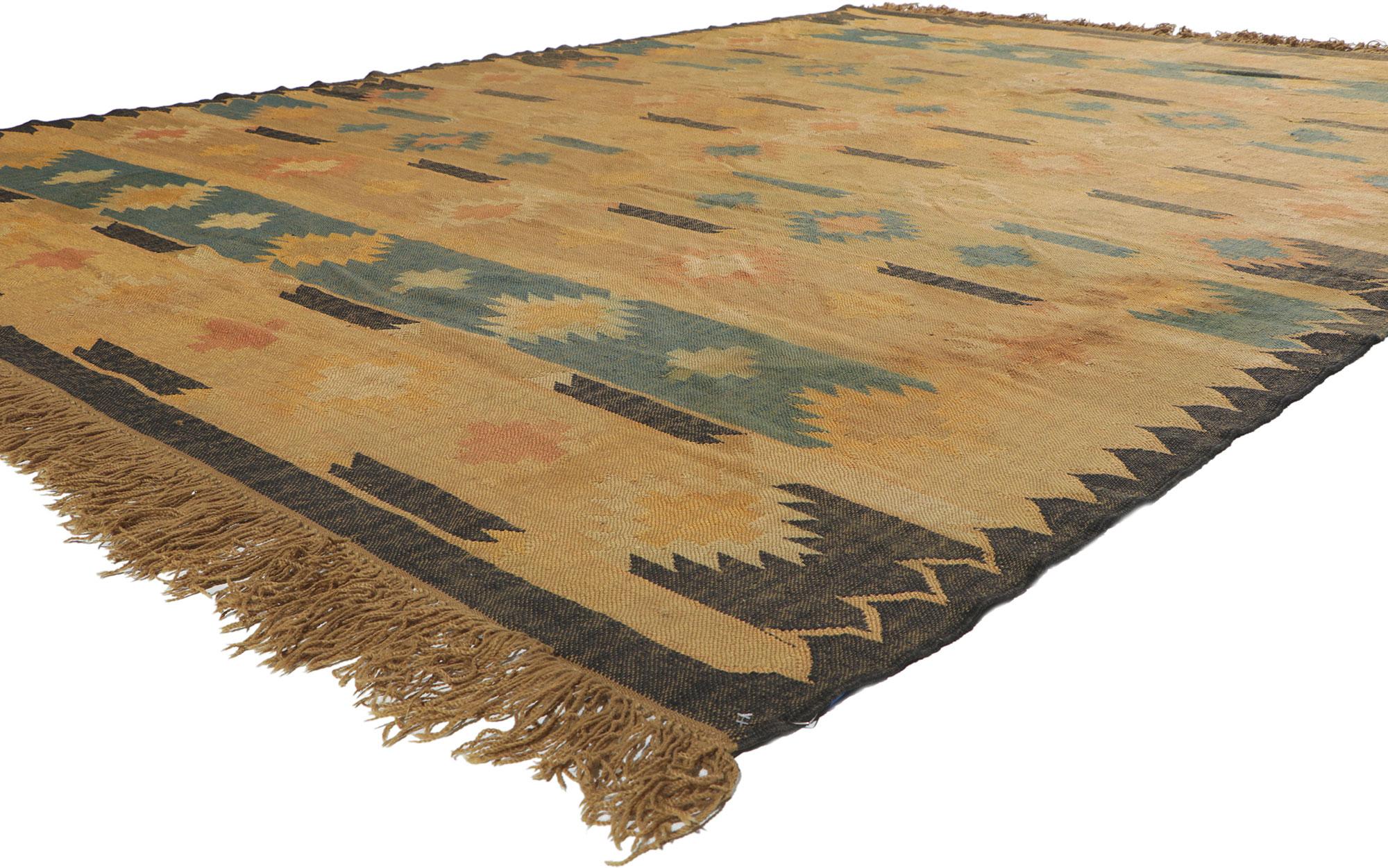 78207 Vintage Indian Kilim Rug, 08'10 x 12'03.
Boho Tribal Meets Southwest Chic​ in this handwoven vintage Indian kilim rug. The southwestern design and rustic earthy colorway woven into this piece work together creating subtle graphic appeal while