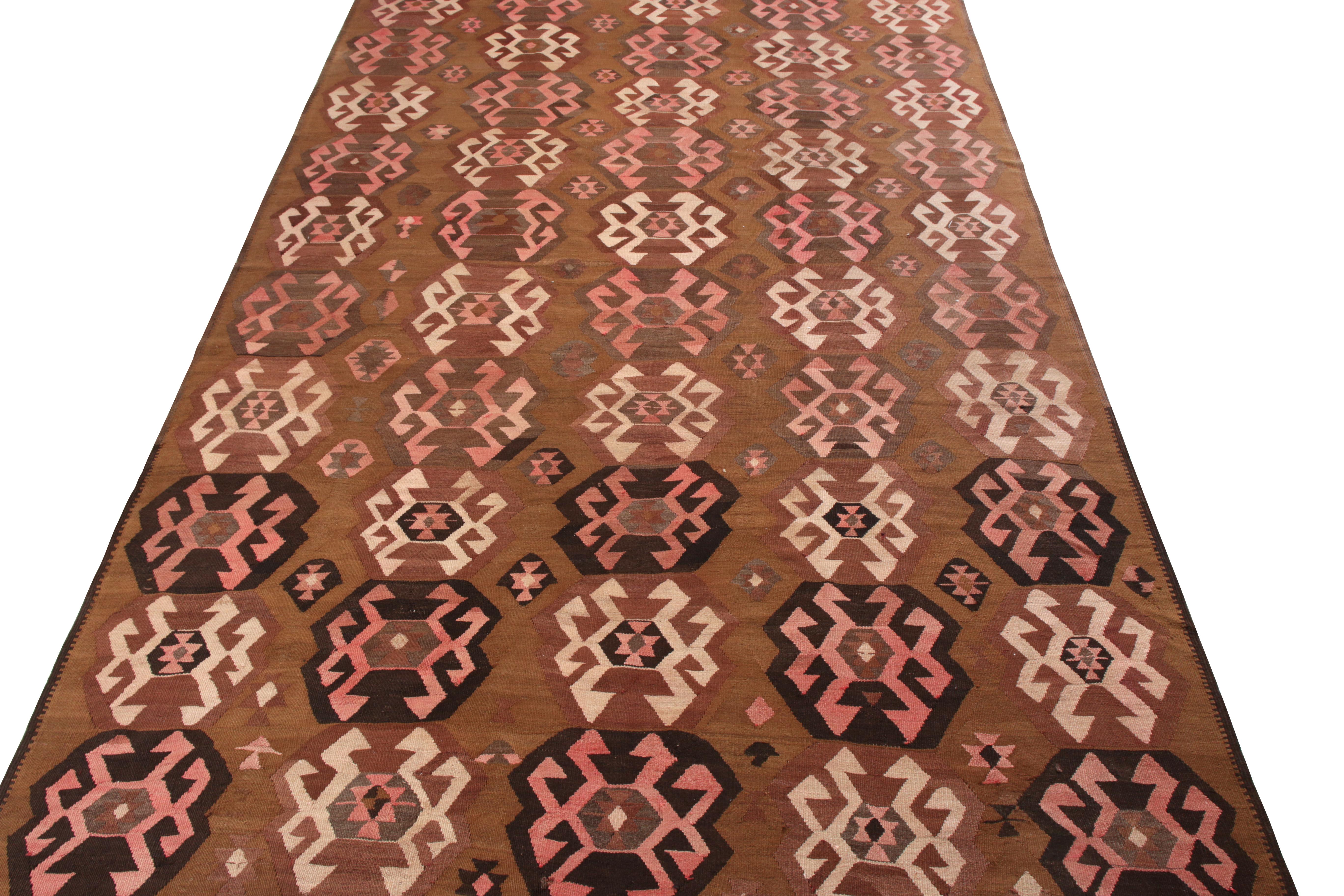 An 8 x 12 Kilim rug in the latest vintage selections from Rug & Kilim—handwoven in wool originating from Turkey circa 1950-1960. Enjoying an all over geometric pattern with an exceptional sense of movement, this particular transitional style