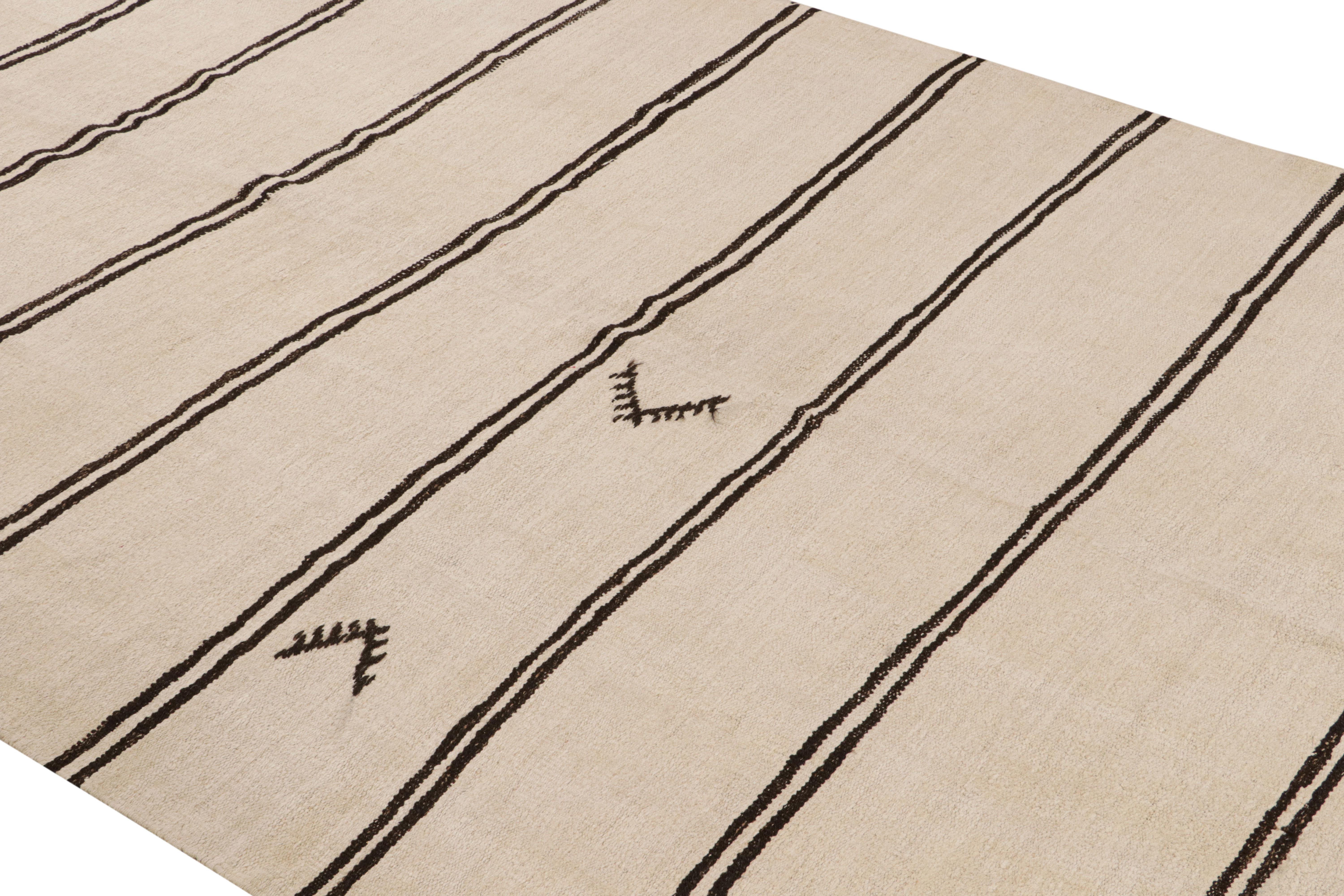 A vintage 6x13 Kilim rug, handwoven in wool originating from Turkey circa 1950-1960. Enjoying crisp off-white and black in a positive-negative play in exemplary length—a forgiving, near-neutral piece seldom-seen in this near-gallery-size. Well