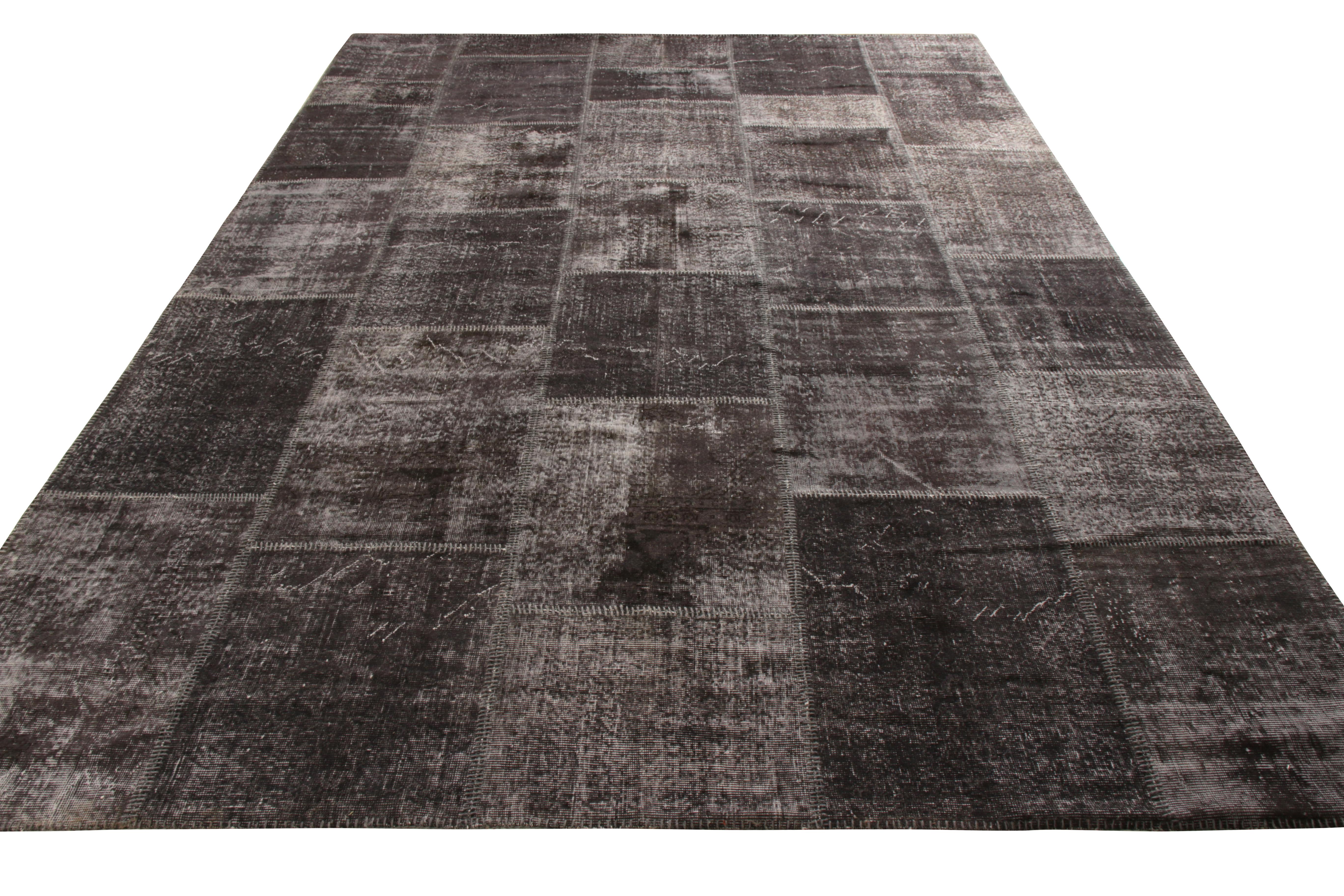 Handwoven in wool from Turkey circa 1980-1990, an 8x12 patchwork Kilim rug of notable rarity in Rug & Kilim’s acclaimed collection. An example of exemplary craftsmanship, this particular patchwork flat weave plays positive negative in black and gray