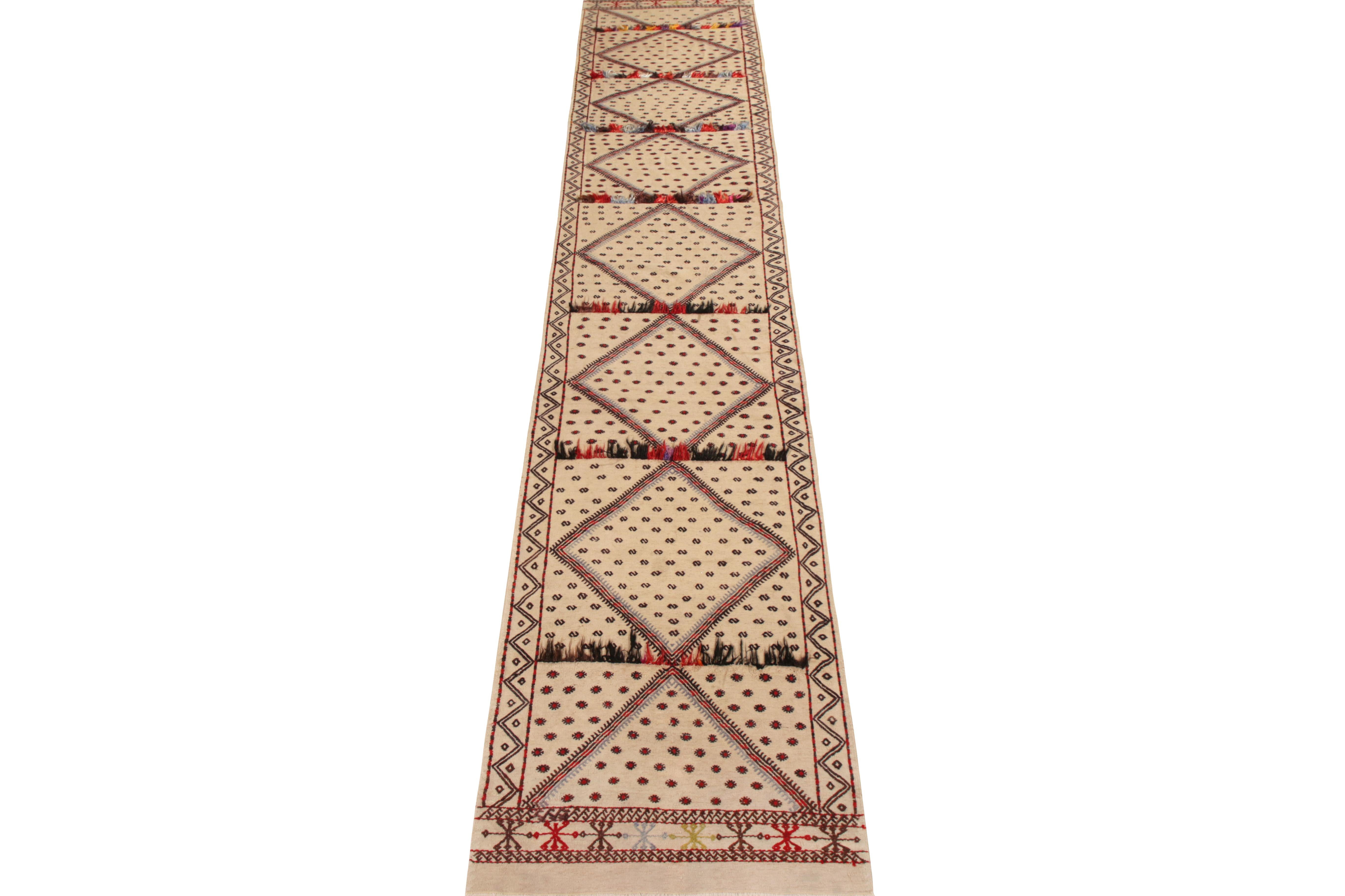 An elegant 3 x 16 Sivas Kilim runner from the vintage selections in Rug & Kilim’s renowned Kilim & Flat Weave Collection. Handwoven in wool originating from Turkey circa 1950–1960, the runner enjoys a rare play of flat weaving and pile techniques.
