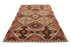 Handwoven Vintage Tribal Kilim Rug in Pink and Green Geometric Pattern