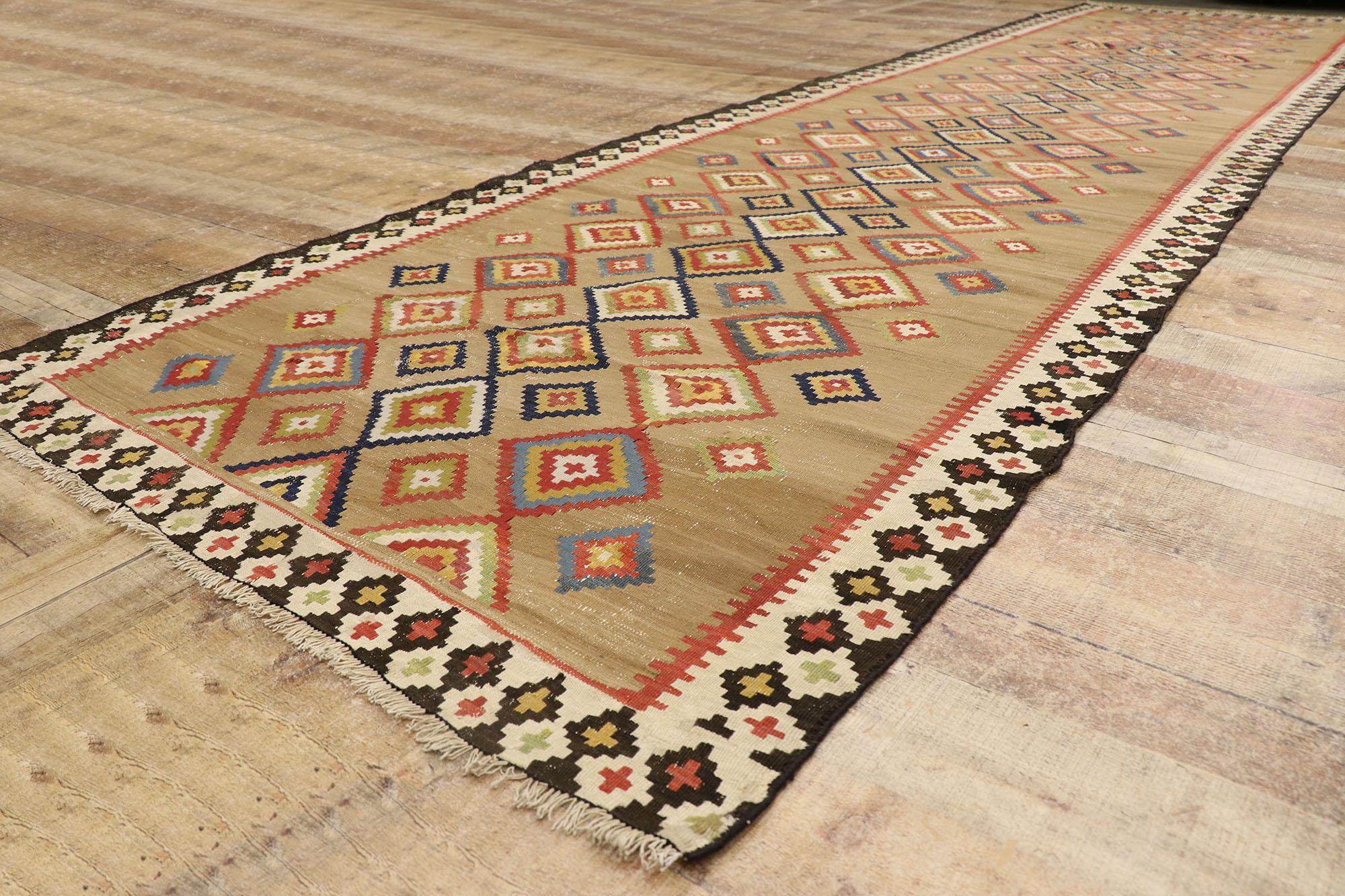 Wool Handwoven Vintage Turkish Kilim Runner with Tribal Style For Sale