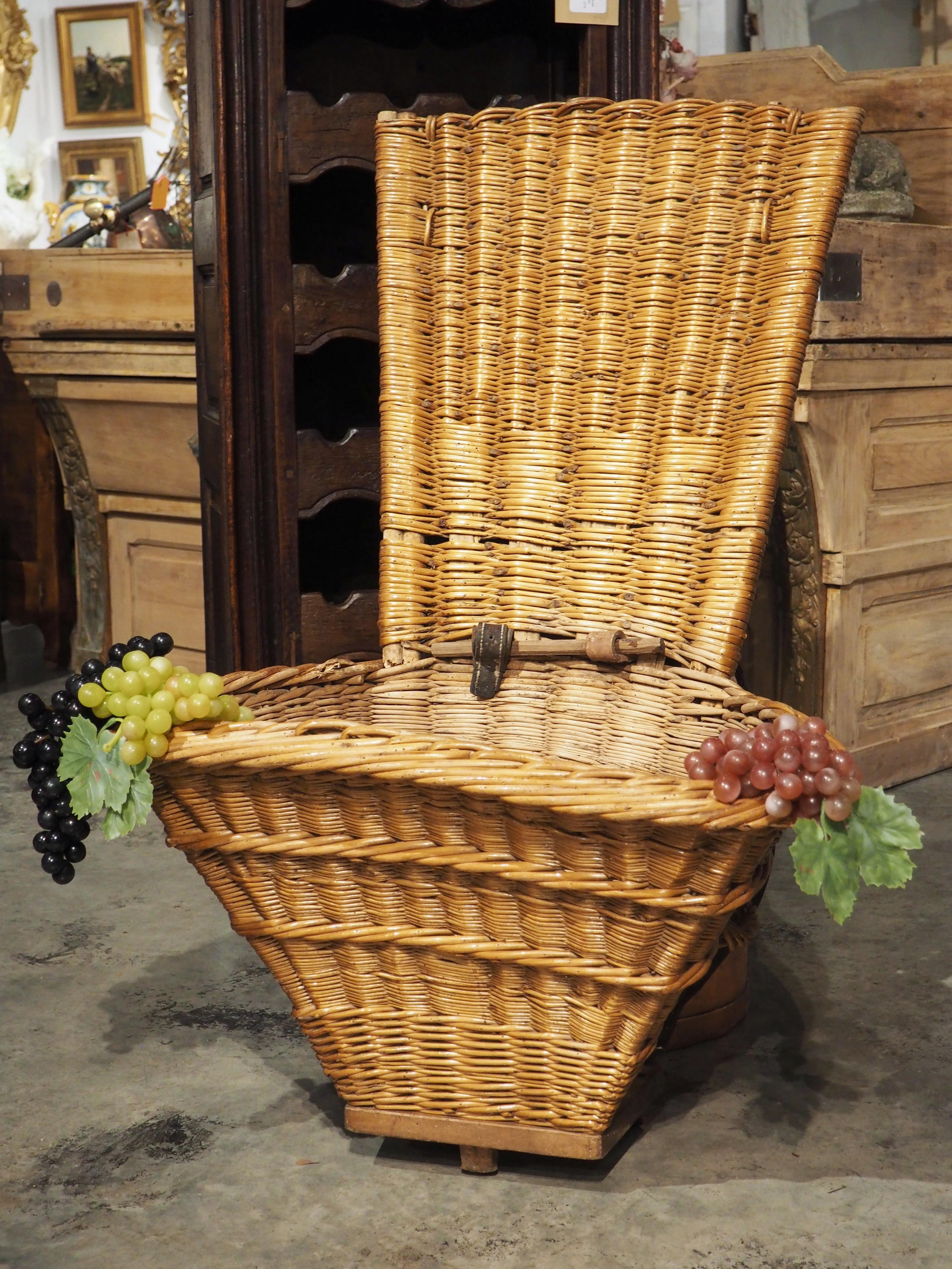 Truly a unique find, this wine grape harvesting basket, or hotte, was handwoven in circa 1890. Many of the grape hottes from the late 19th and early 20th century were made out of metal, but this particular basket, which was found in Beaune, France