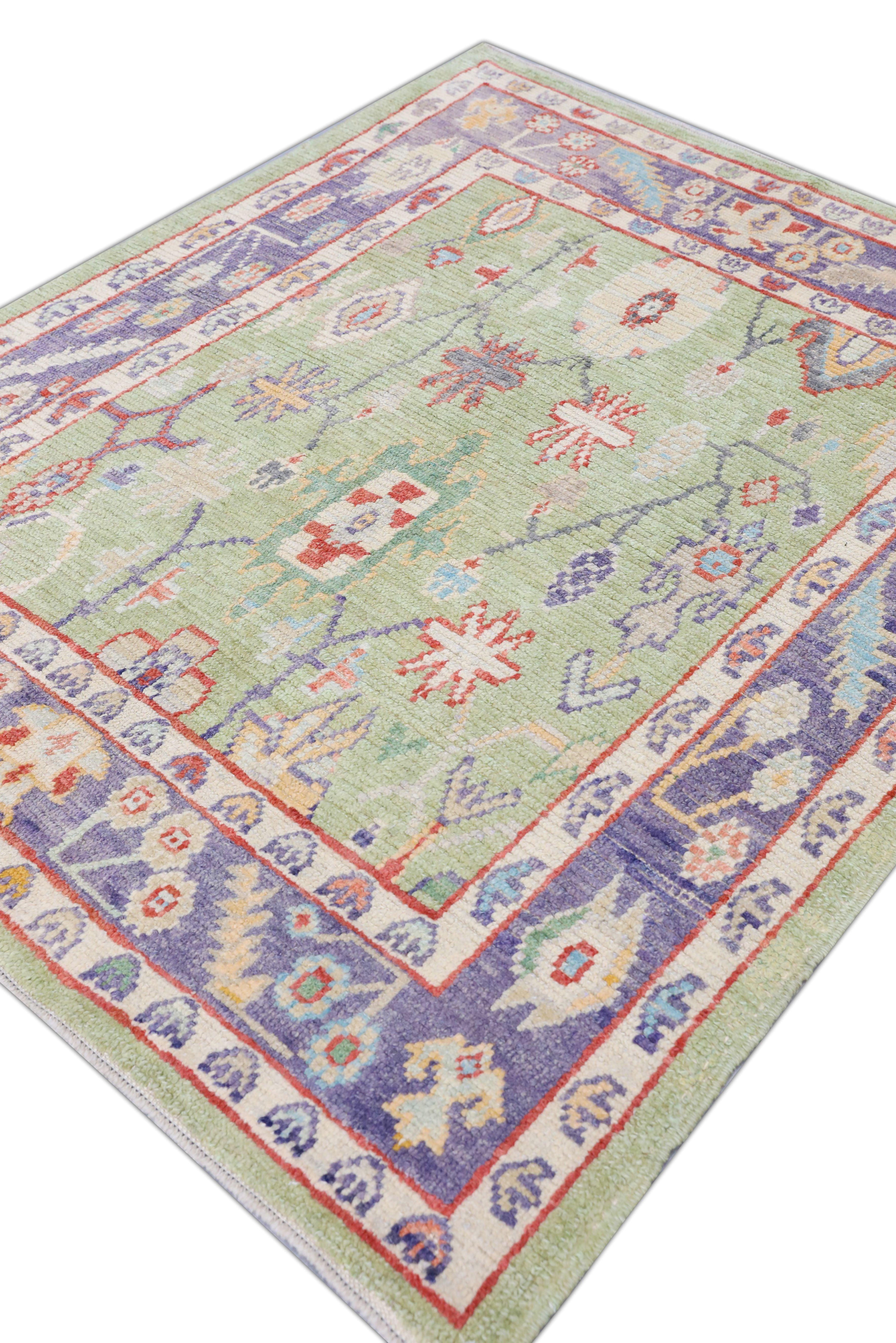 This Turkish oushak rug is a stunning piece of art that has been handwoven using traditional techniques by skilled artisans. The rug features intricate patterns and a soft color palette that is achieved through the use of natural vegetable