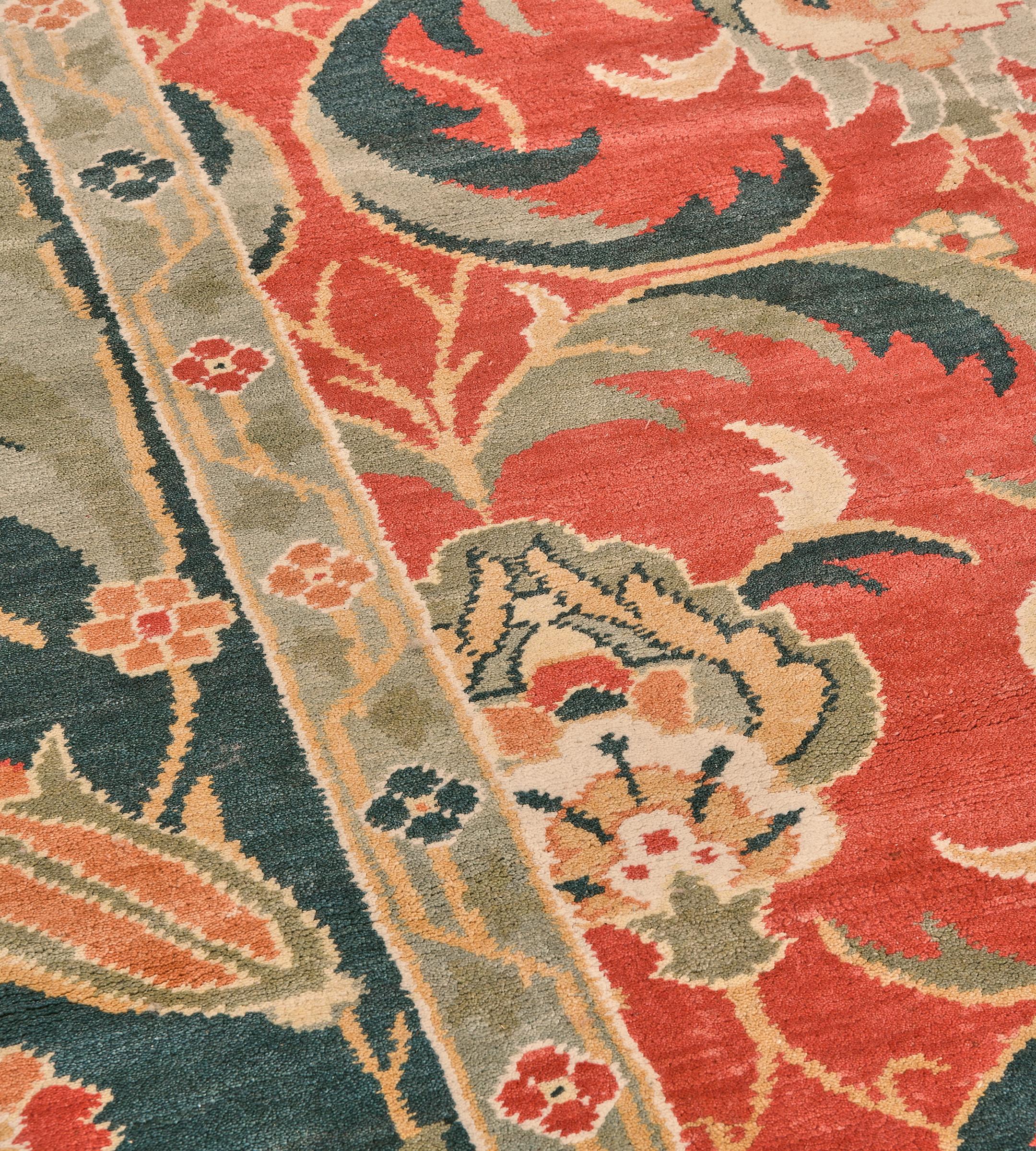 Egyptian Handwoven Wool Revival Tomato-Red Floral Arts & Crafts Inspired Rug For Sale