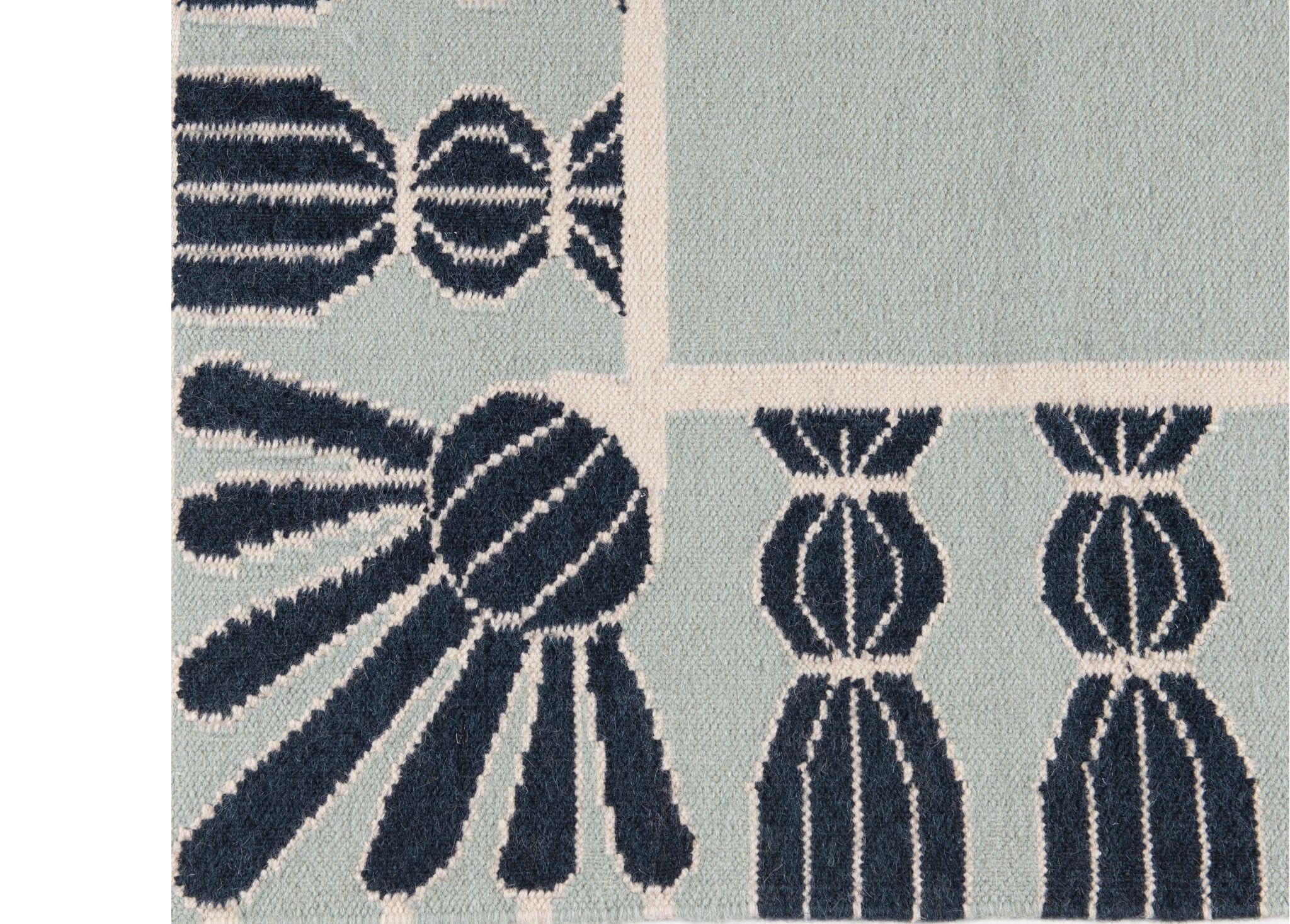 Handwoven Wool Tassel Rug, 9' x 12', Sky Blue, Navy, and Eggshell In New Condition For Sale In Charlotte, NC