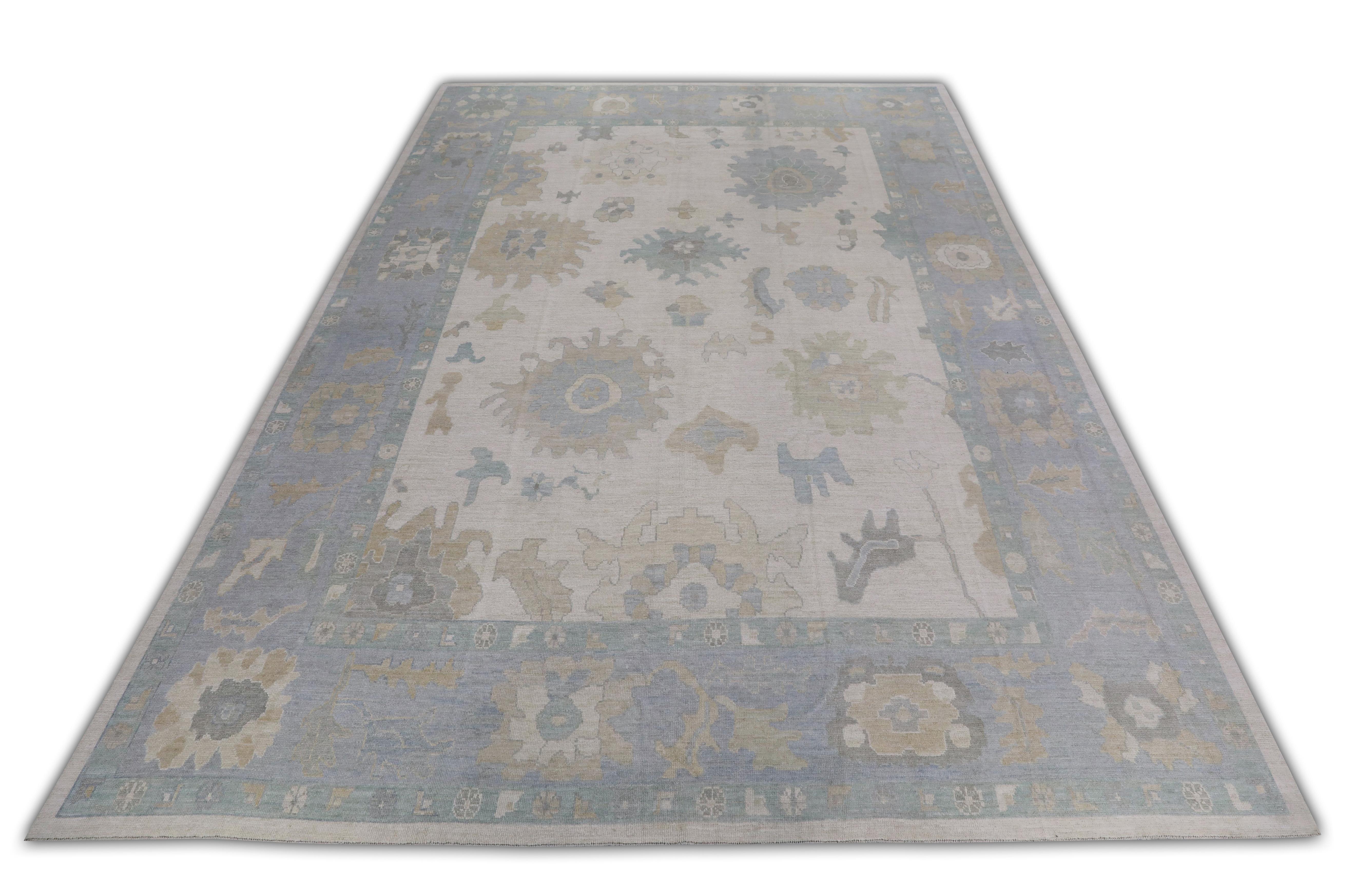 This Turkish oushak rug is a stunning piece of art that has been handwoven using traditional techniques by skilled artisans. The rug features intricate patterns and a soft color palette that is achieved through the use of natural vegetable dyes.