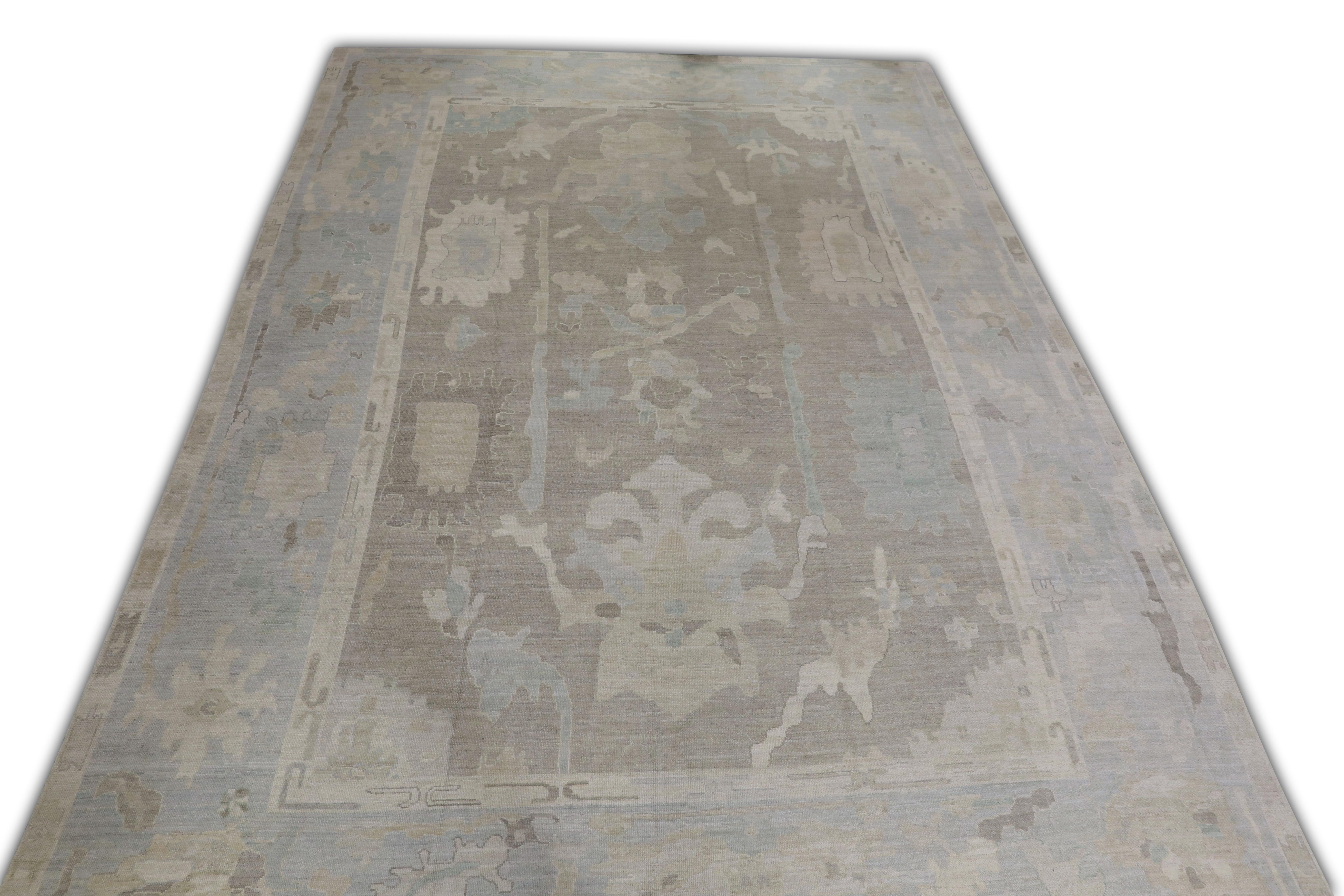 This Turkish oushak rug is a stunning piece of art that has been handwoven using traditional techniques by skilled artisans. The rug features intricate patterns and a soft color palette that is achieved through the use of natural vegetable dyes.