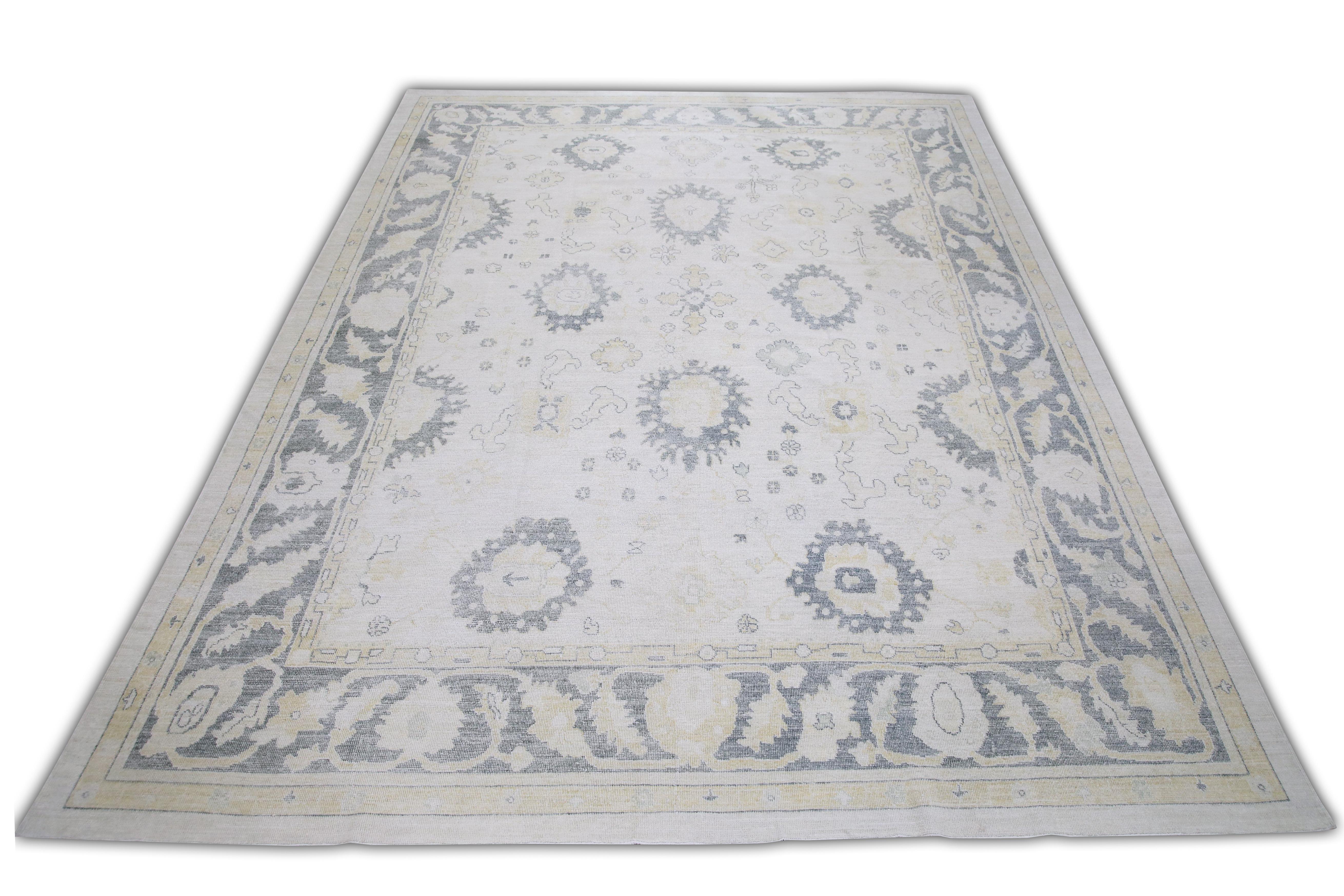 This Turkish oushak rug is a stunning piece of art that has been handwoven using traditional techniques by skilled artisans. The rug features intricate patterns and a soft color palette that is achieved through the use of natural vegetable dyes.