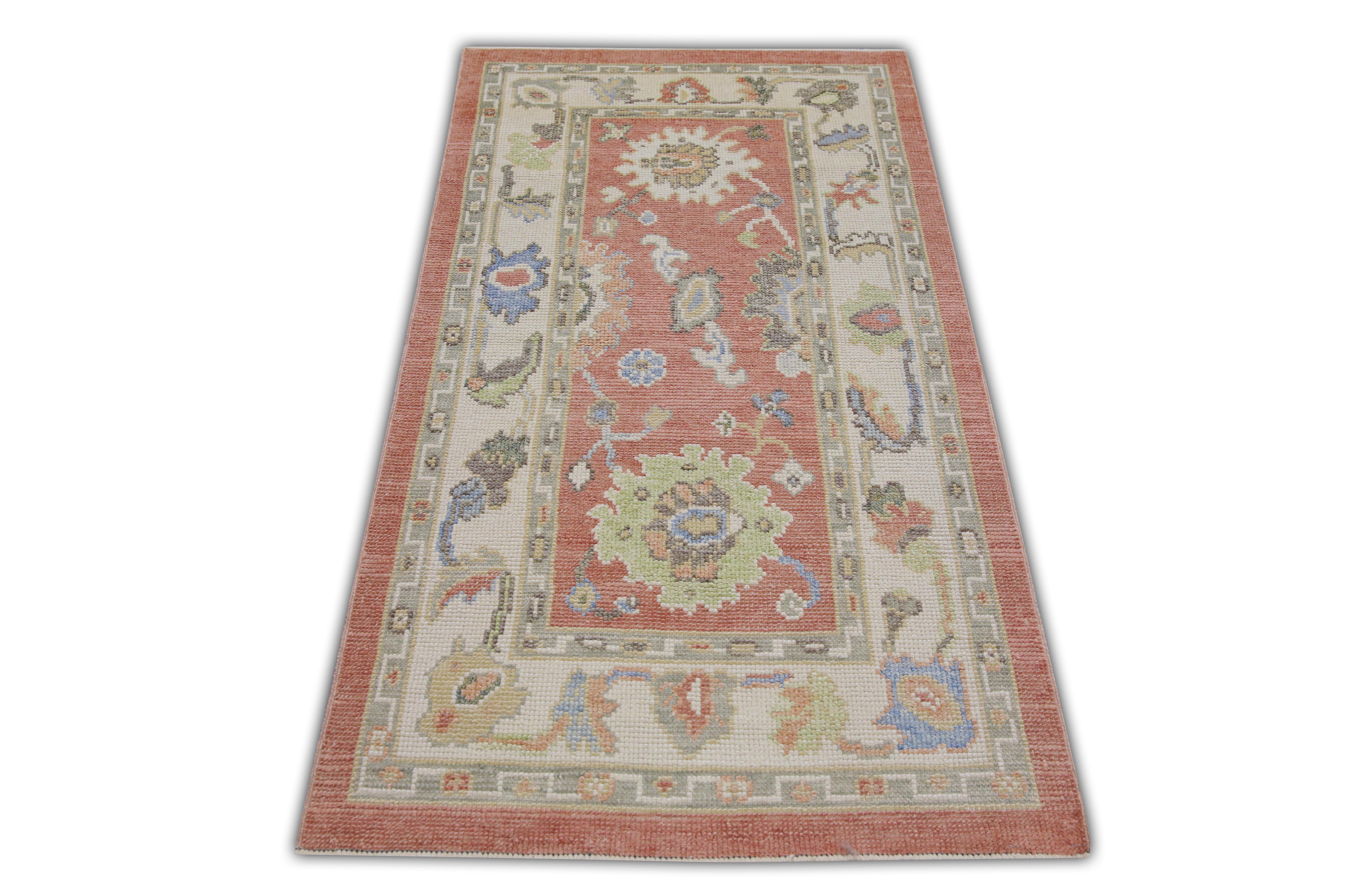 This Turkish oushak rug is a stunning piece of art that has been handwoven using traditional techniques by skilled artisans. The rug features intricate patterns and a soft color palette that is achieved through the use of natural vegetable