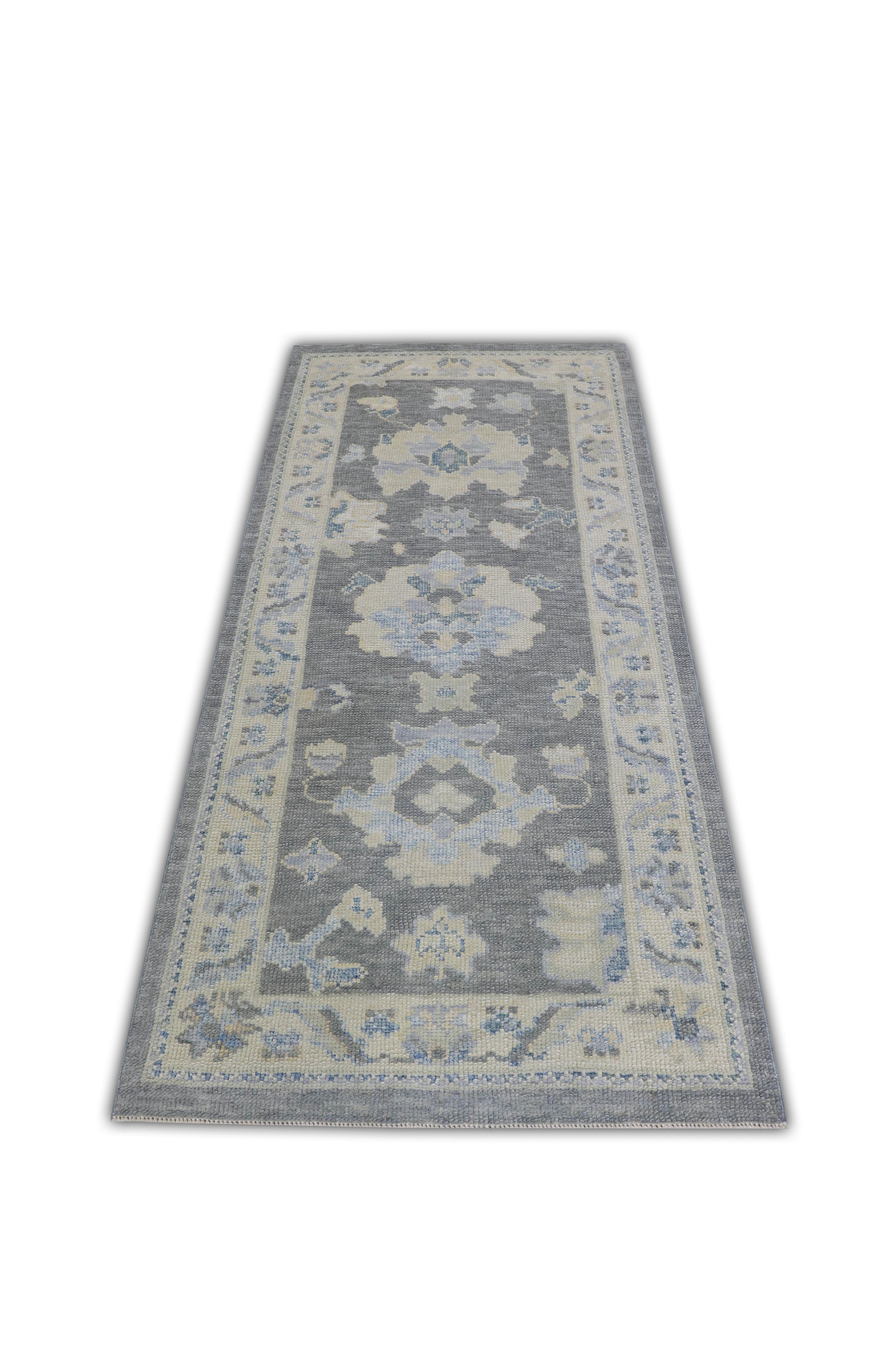 This Turkish oushak rug is a stunning piece of art that has been handwoven using traditional techniques by skilled artisans. The rug features intricate patterns and a soft color palette that is achieved through the use of natural vegetable dyes.