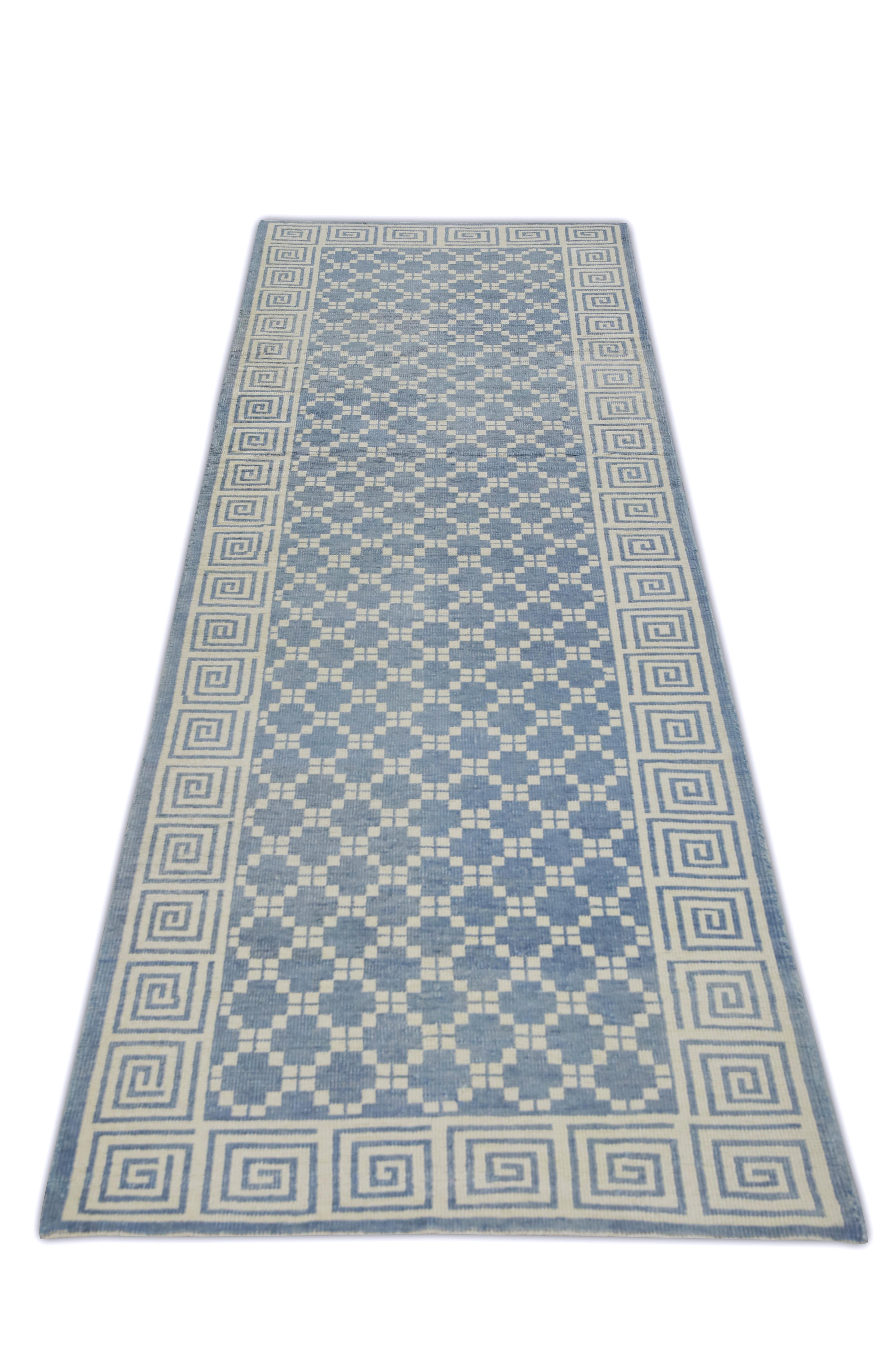 This Turkish oushak rug is a stunning piece of art that has been handwoven using traditional techniques by skilled artisans. The rug features intricate patterns and a soft color palette that is achieved through the use of natural vegetable
