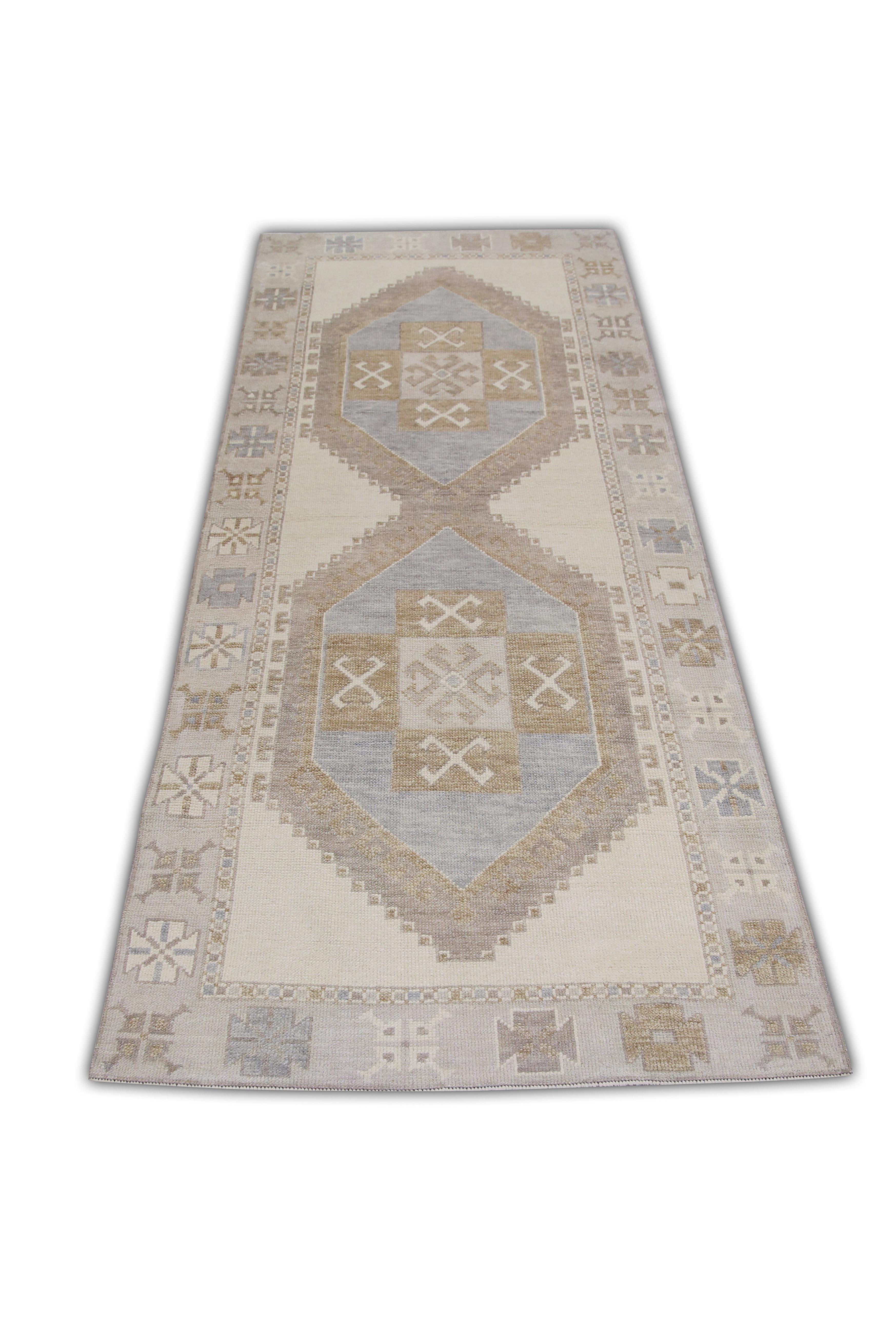 This Turkish oushak rug is a stunning piece of art that has been handwoven using traditional techniques by skilled artisans. The rug features intricate patterns and a soft color palette that is achieved through the use of natural vegetable