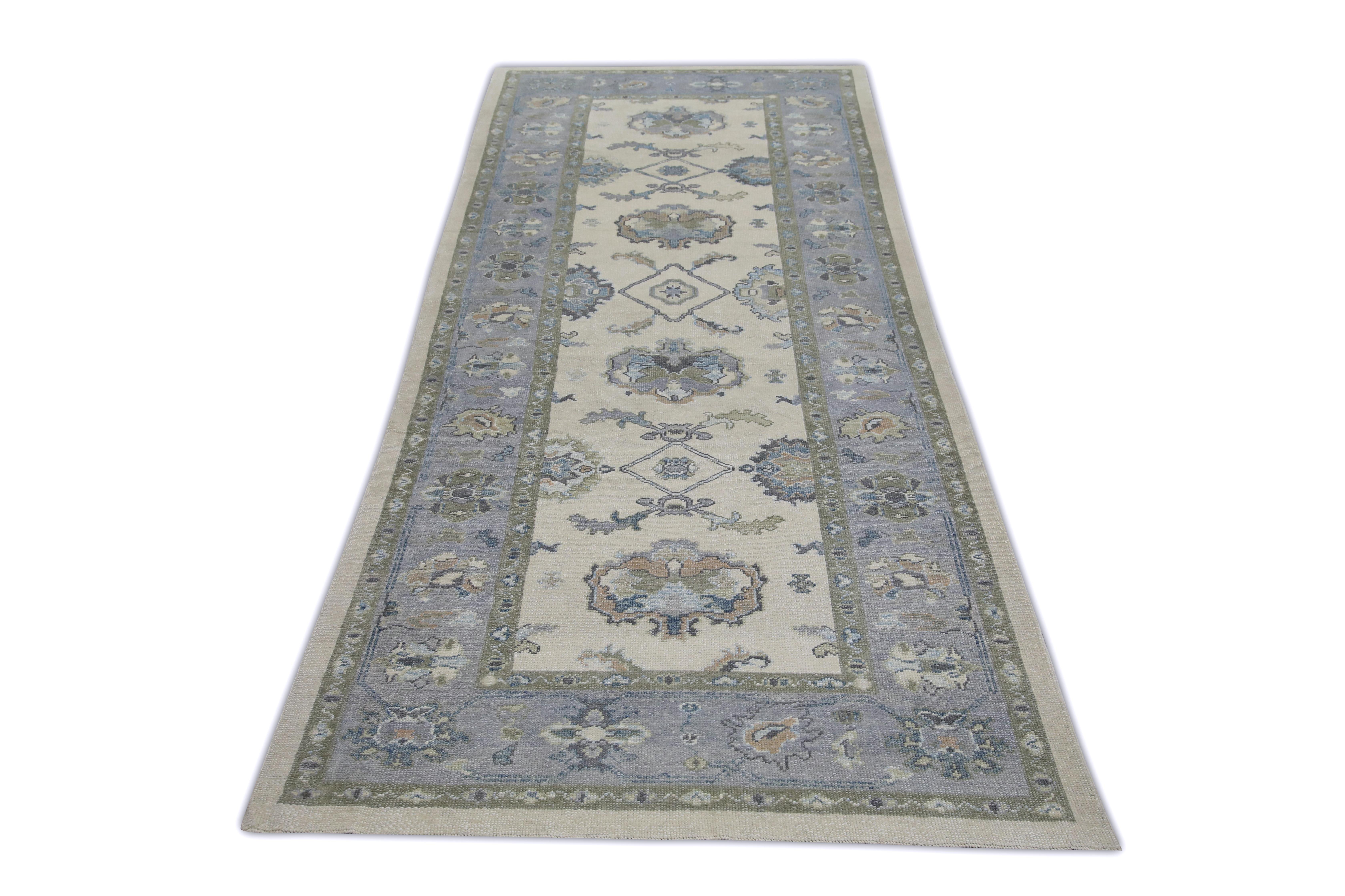 This Turkish oushak rug is a stunning piece of art that has been handwoven using traditional techniques by skilled artisans. The rug features intricate patterns and a soft color palette that is achieved through the use of natural vegetable