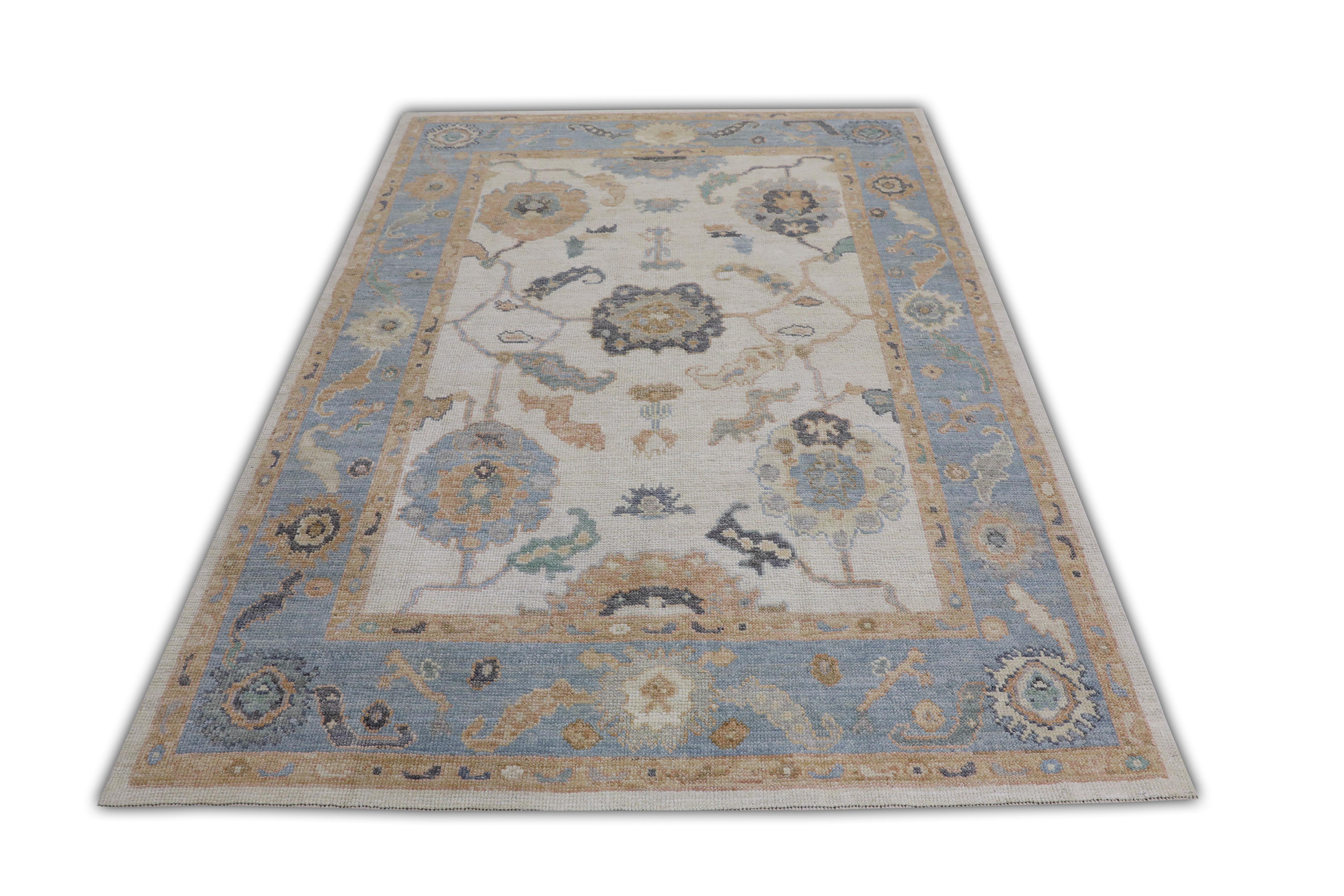 This Turkish oushak rug is a stunning piece of art that has been handwoven using traditional techniques by skilled artisans. The rug features intricate patterns and a soft color palette that is achieved through the use of natural vegetable dyes.
