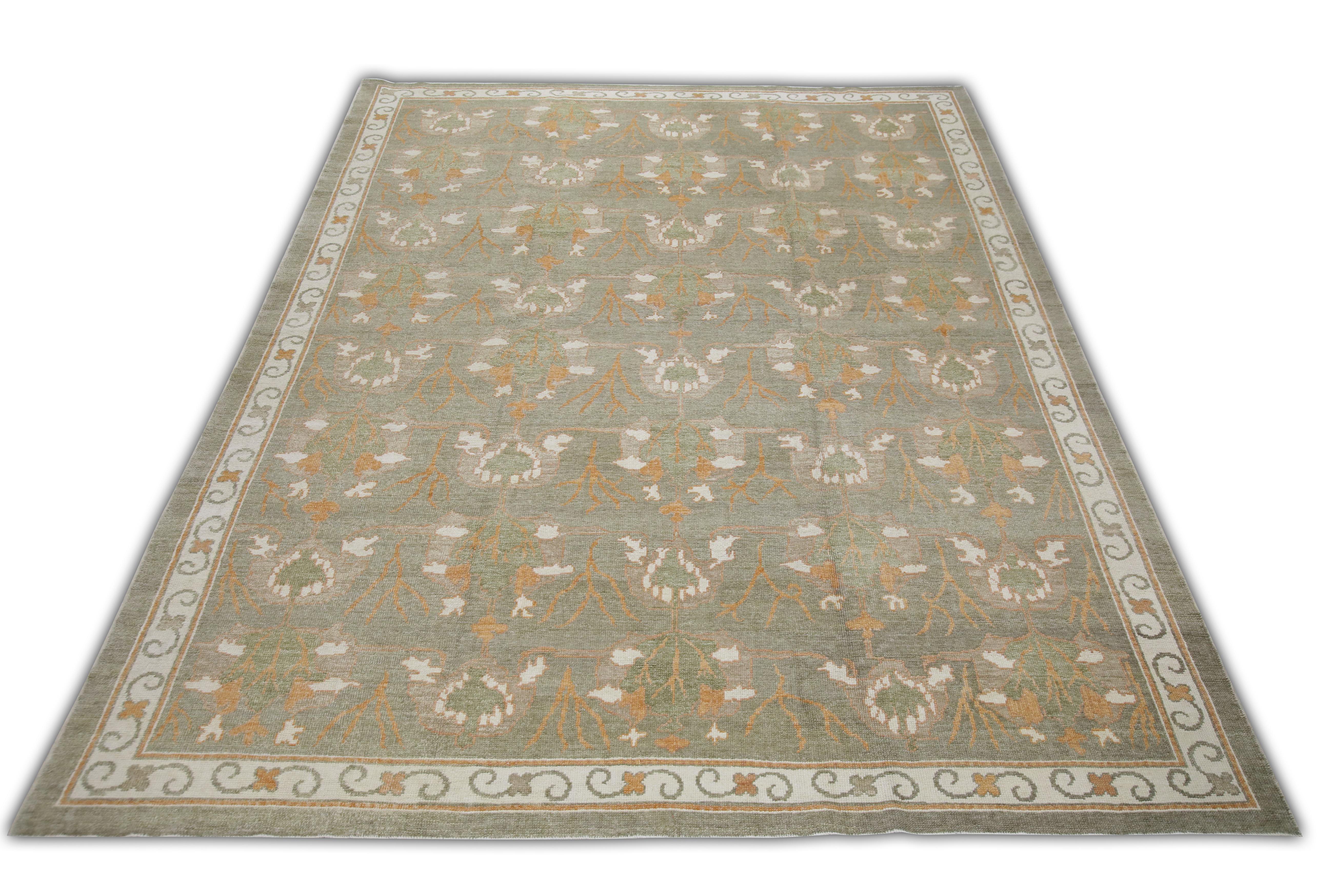 This Turkish oushak rug is a stunning piece of art that has been handwoven using traditional techniques by skilled artisans. The rug features intricate patterns and a soft color palette that is achieved through the use of natural vegetable dyes.