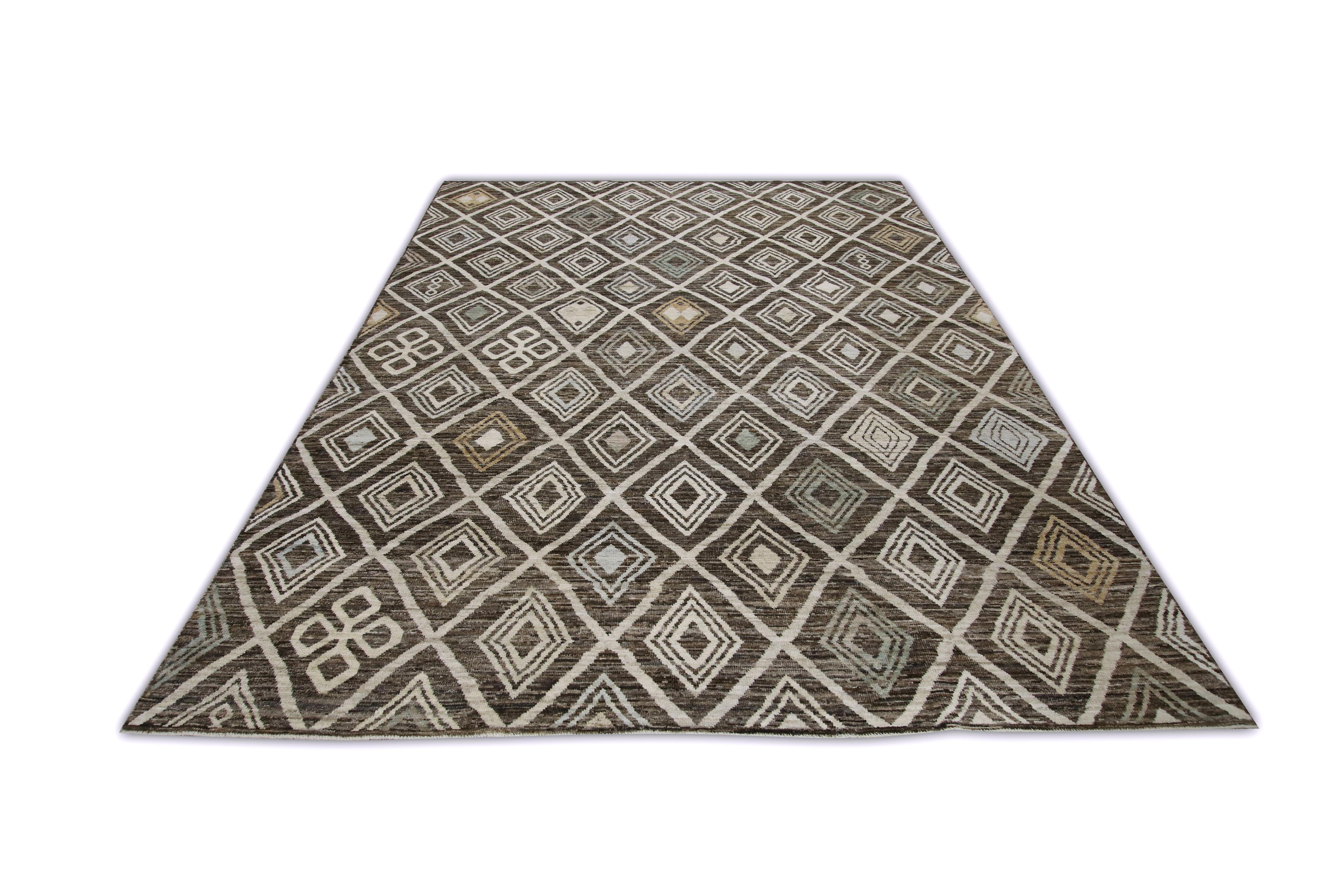 This Turkish oushak rug is a stunning piece of art that has been handwoven using traditional techniques by skilled artisans. The rug features intricate patterns and a soft color palette that is achieved through the use of natural vegetable