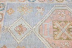 Alfombra Oushak Turca de Lana Tejida a Mano con Diseño de Medallón Azul 3'3" x 4'6