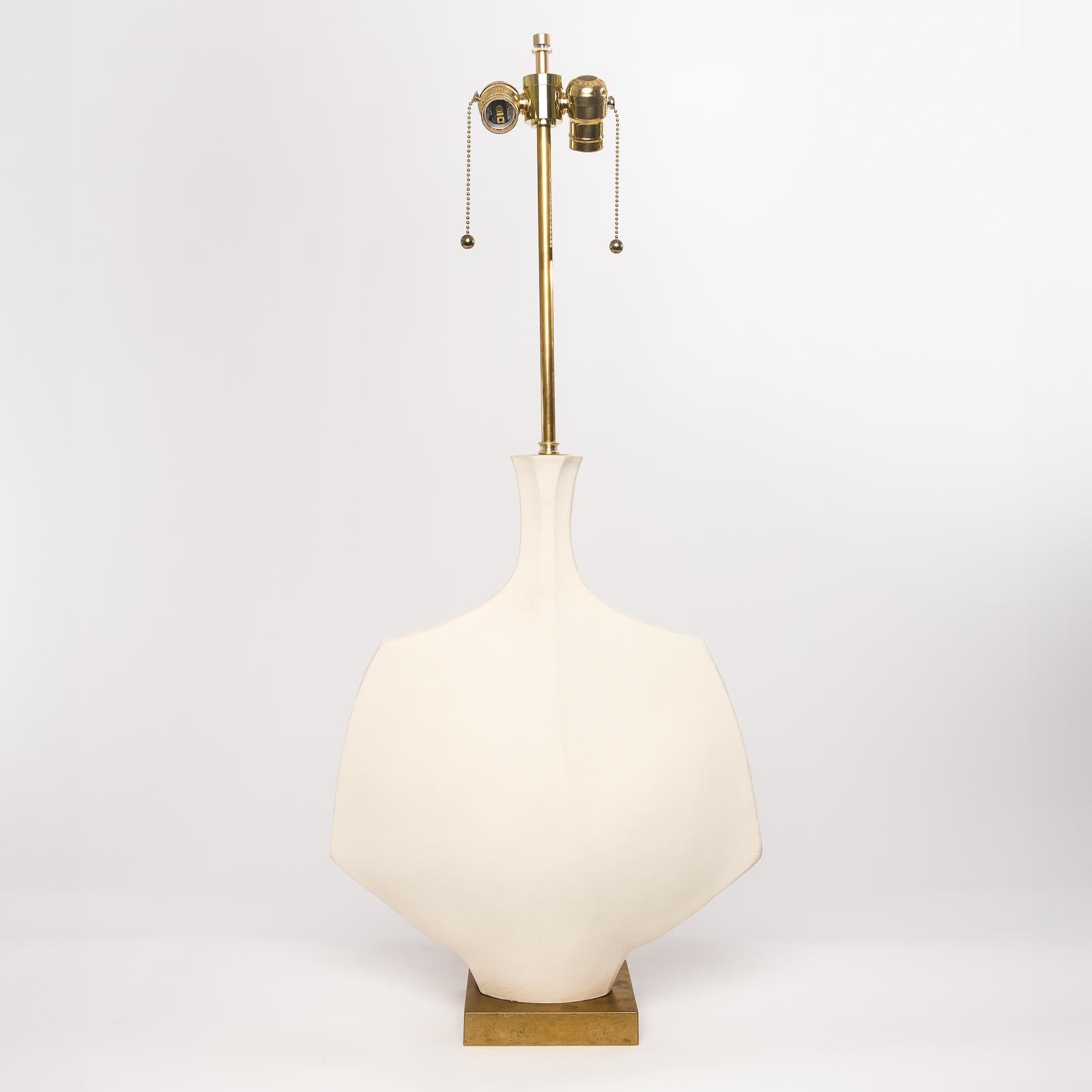 This large edition of the Hane Sculpture Lamp is a statement piece combining modernist design with nature-inspired elegance.

Crafted by hand from white stoneware in Los Angeles, this lamp draws inspiration from the wings of black swallowtail