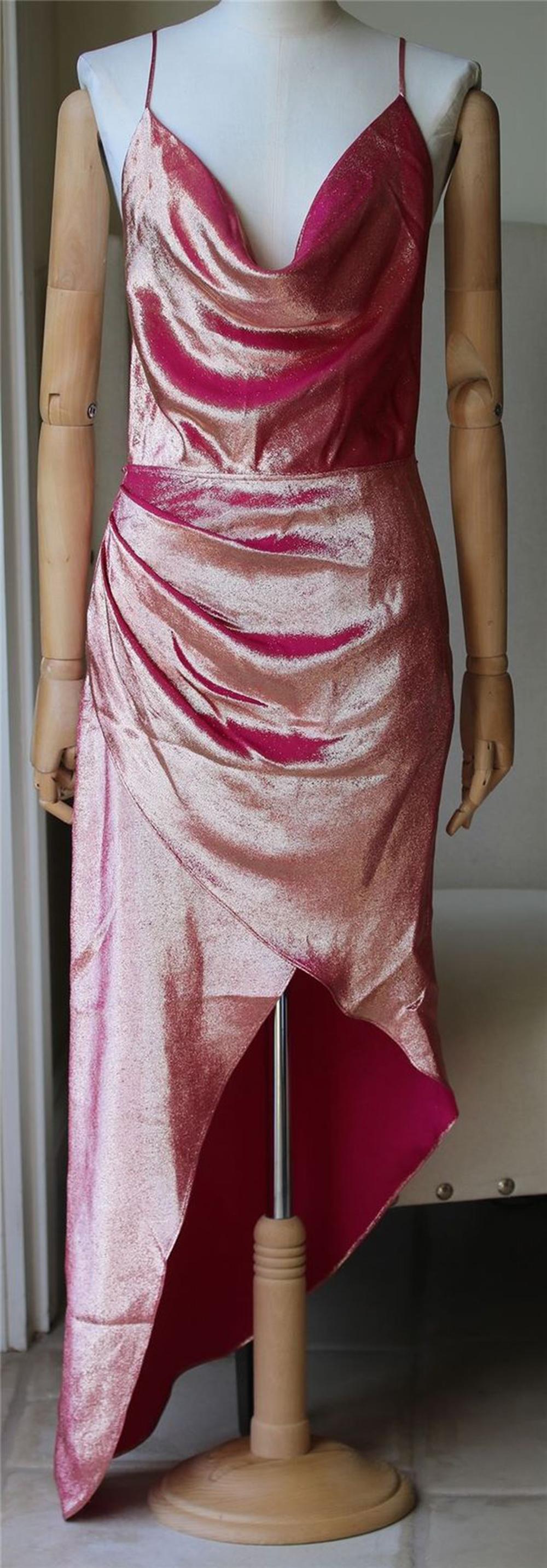 Stand out from the crowd in this iridescent pink dress, featuring a draped cowl neck, open back, and a high-low hem. Thin crisscross back straps. Concealed side zip closure. In pink. Fabric: 100% silk Made in Los Angeles. 

Size: US 2 (UK 6, FR 34,