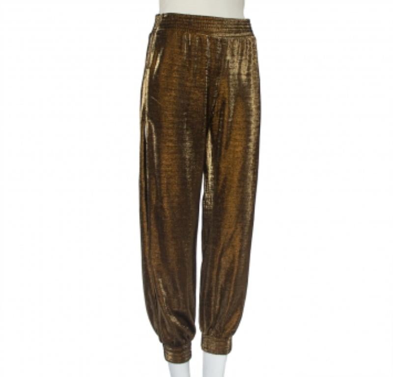 Who knew joggers could look so stylish! These lurex knit metallic harem ones from Haney are made of quality materials and styled with side slits for a statement look.  Equipped with an elasticized waistband, they are comfortable to wear and will