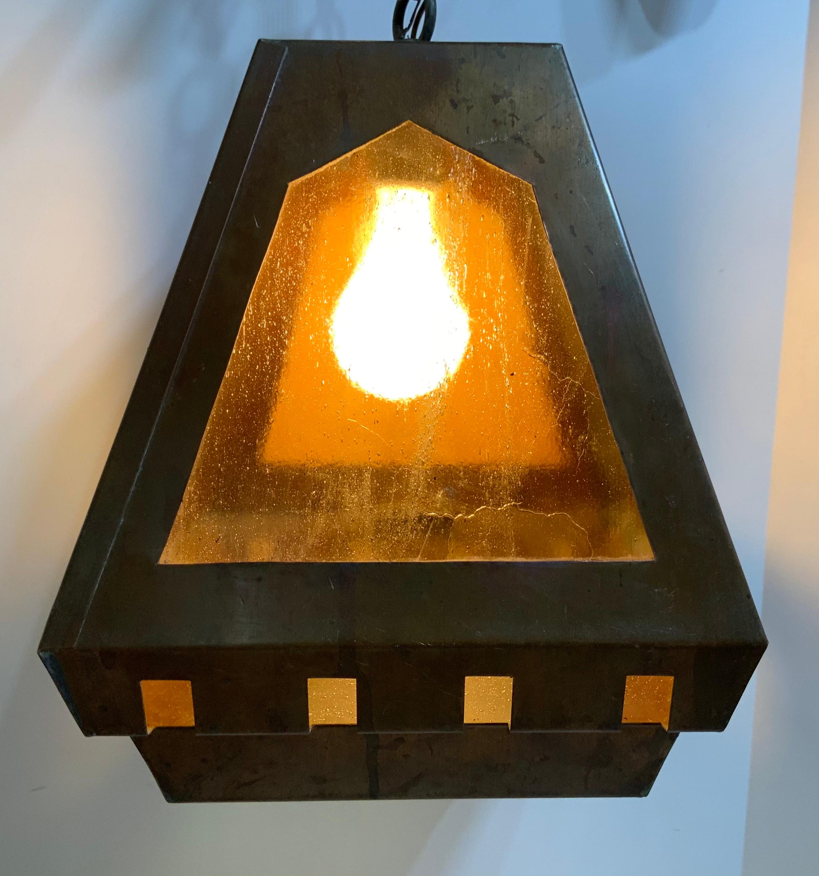 Elegant lantern made of hand crafted copper, quality workmanship, four sides of art glass, and one 60/watt light. Suitable for wet location, original canopy and chain is included.
    