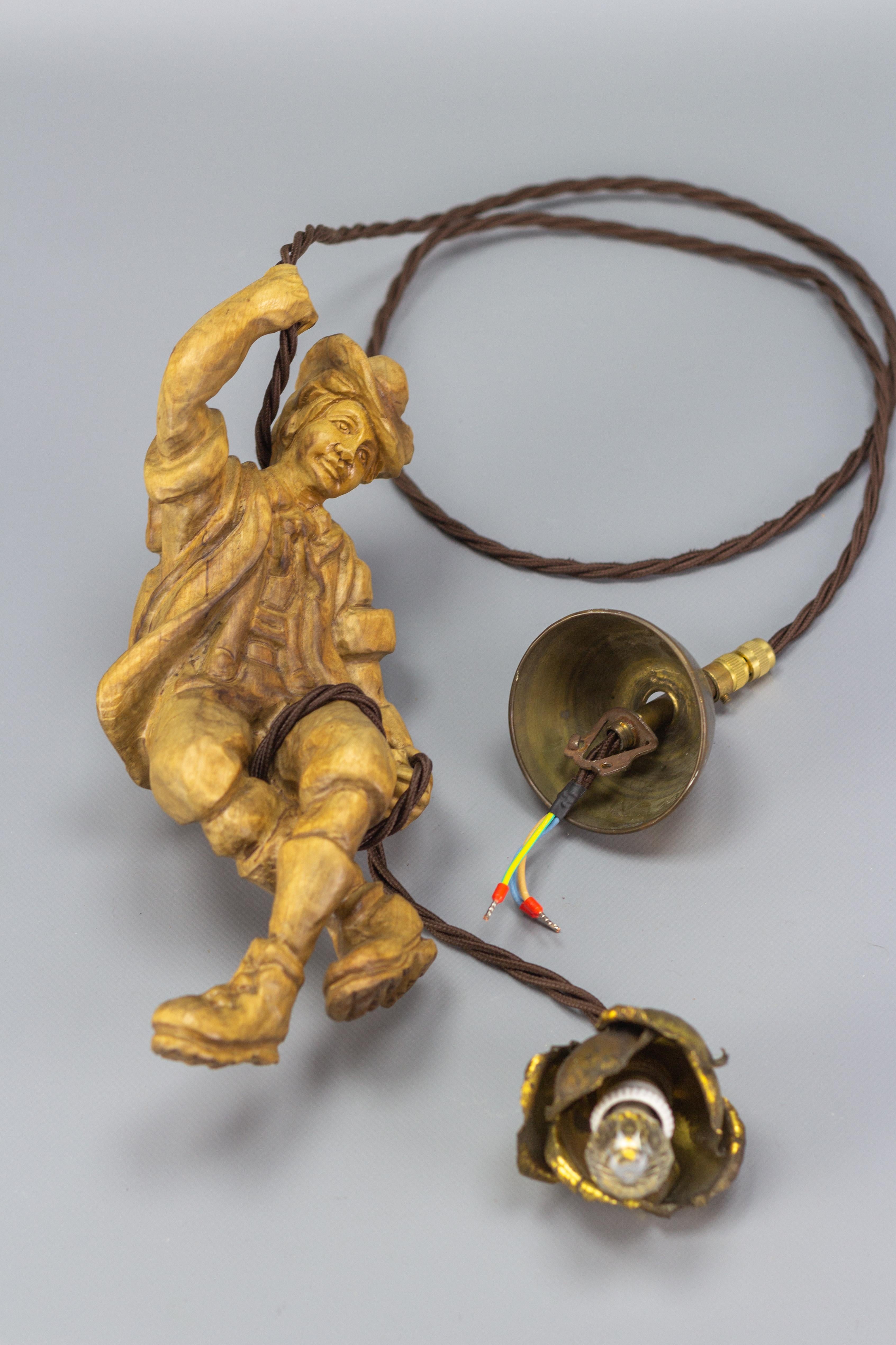 Hanging Brass Light Fixture with a Wooden Figure of a Mountain Climber For Sale 2