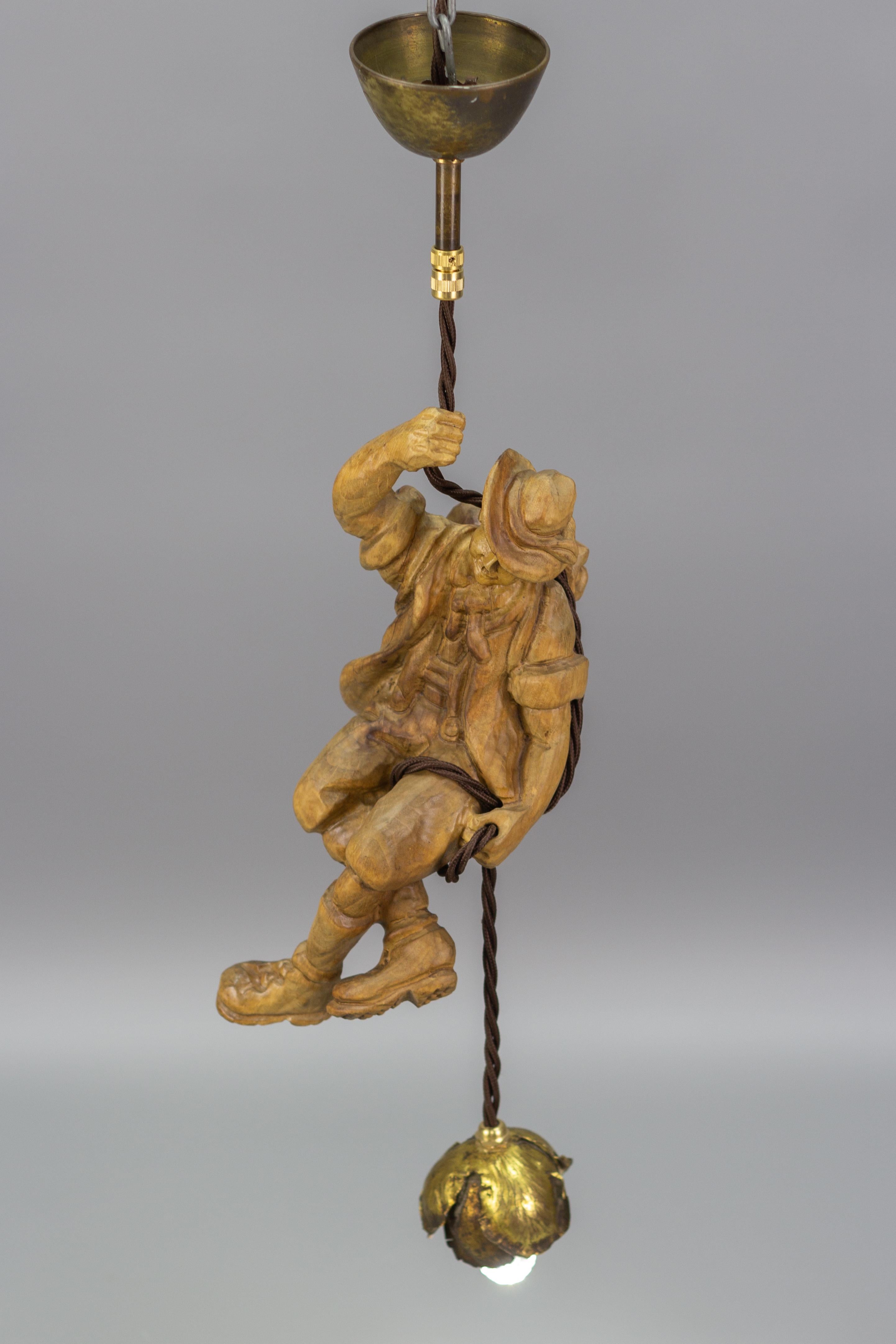 Hanging Brass Light Fixture with a Wooden Figure of a Mountain Climber For Sale 11