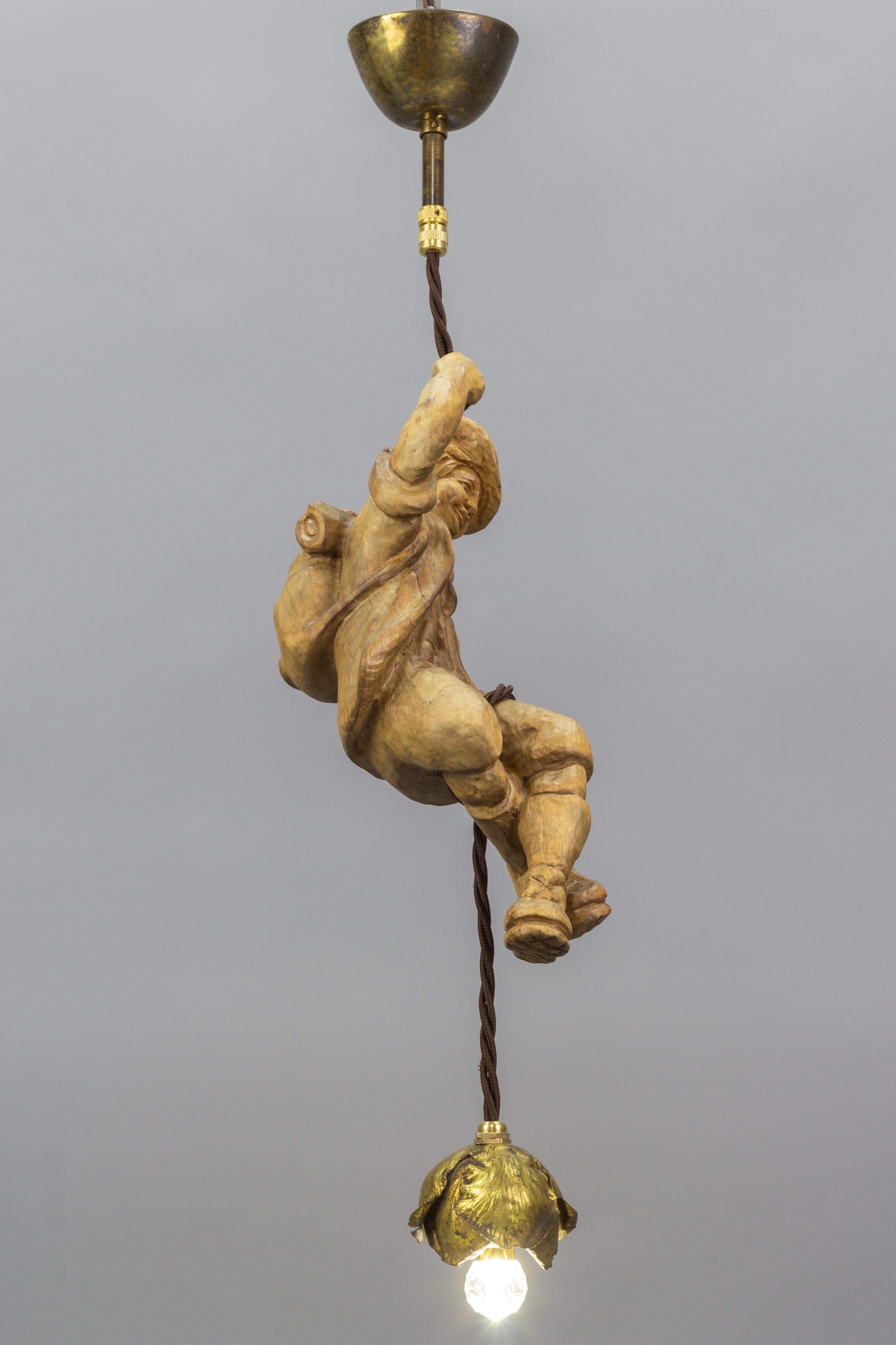 Mid-20th Century Hanging Brass Light Fixture with a Wooden Figure of a Mountain Climber For Sale